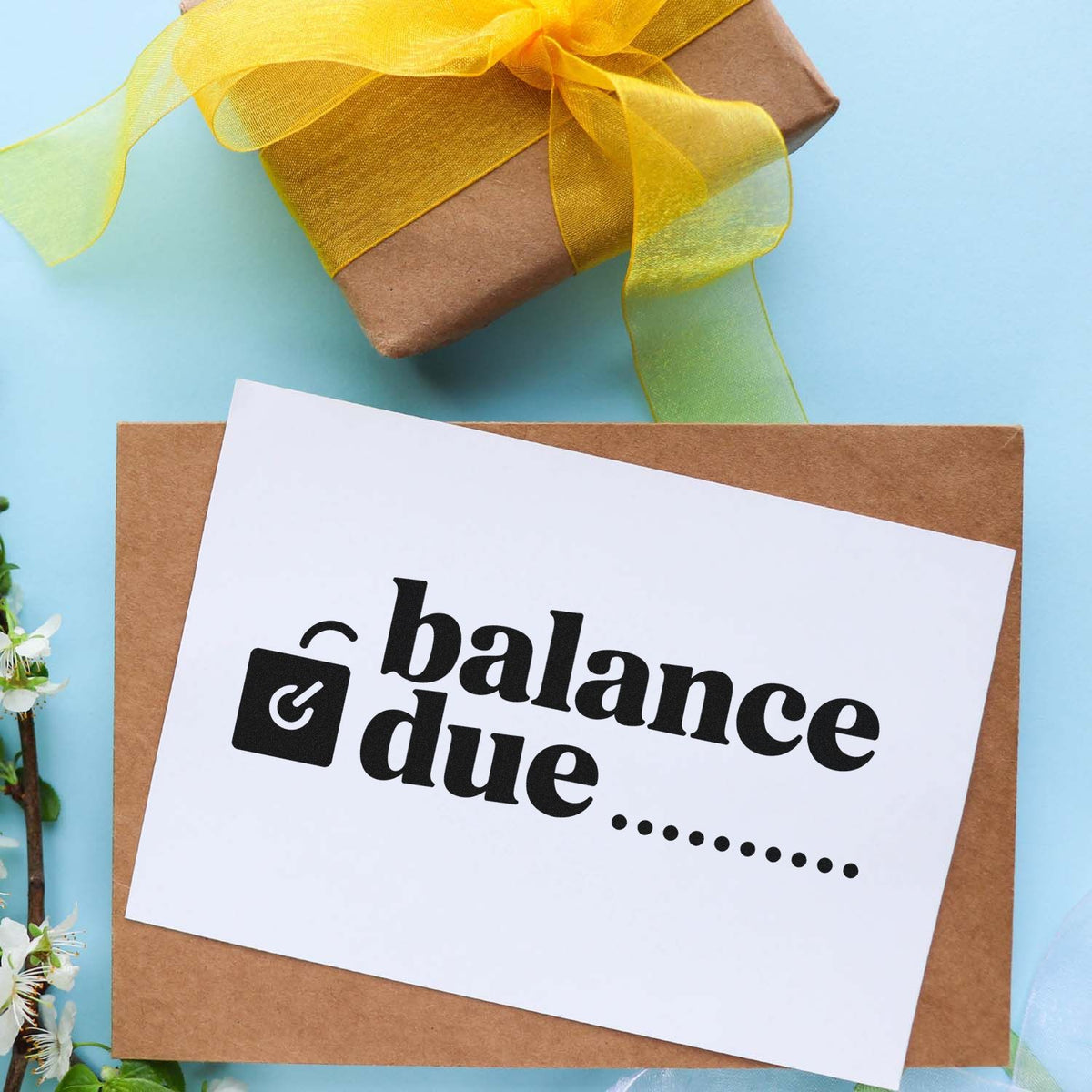 Balance due rubber stamp design on package, perfect for invoice reminders, billing notices, and small business mailers.