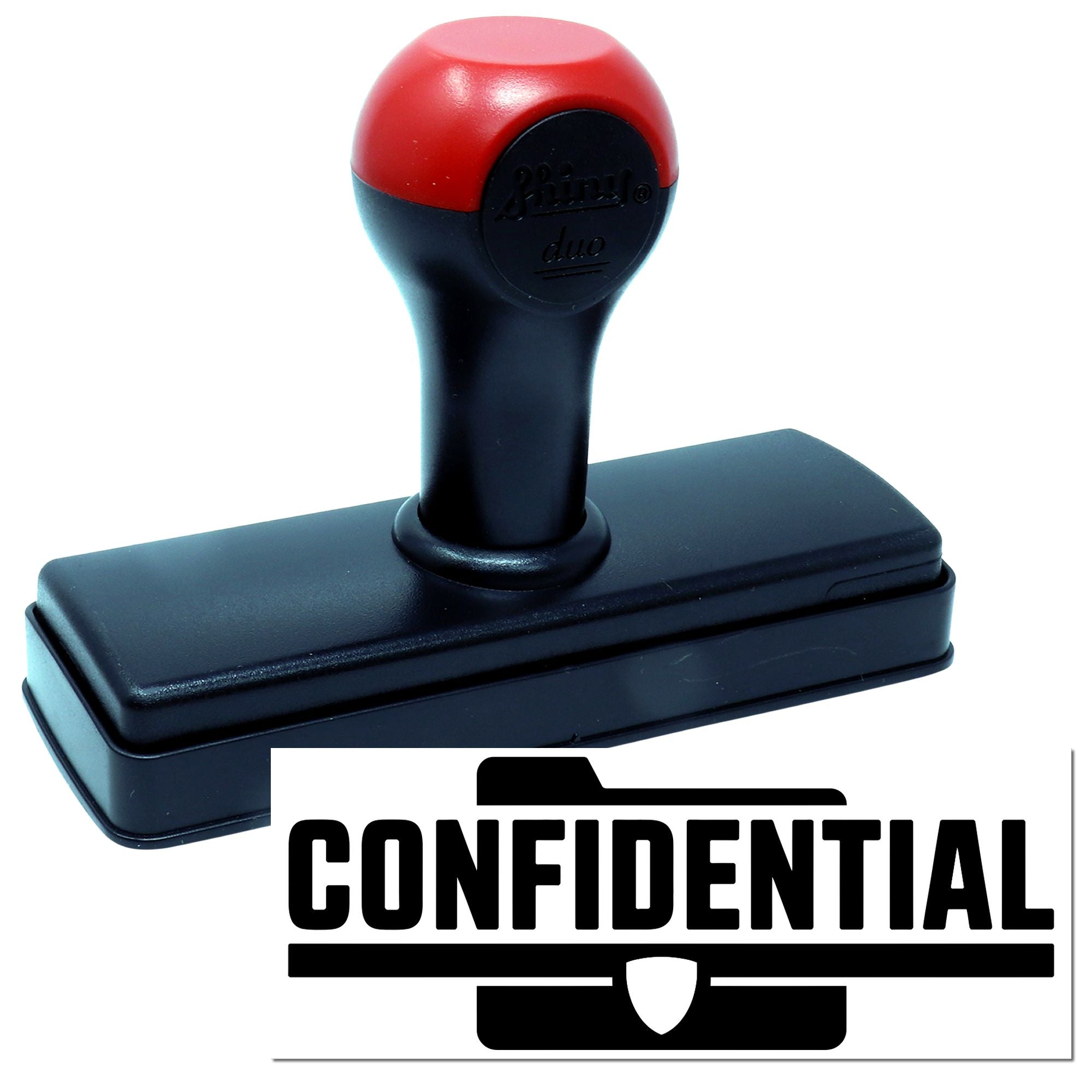 Confidential rubber stamp with red and black handle for marking documents and files secure.