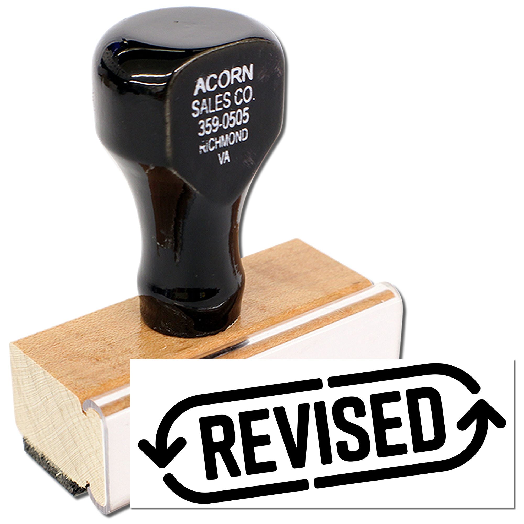 Custom rubber stamp with Revised imprint, ideal for marking approved document updates and office paperwork.