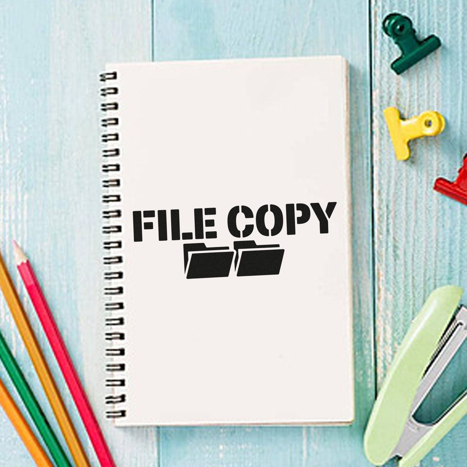File Copy rubber stamp design on notebook for office document filing and organization.