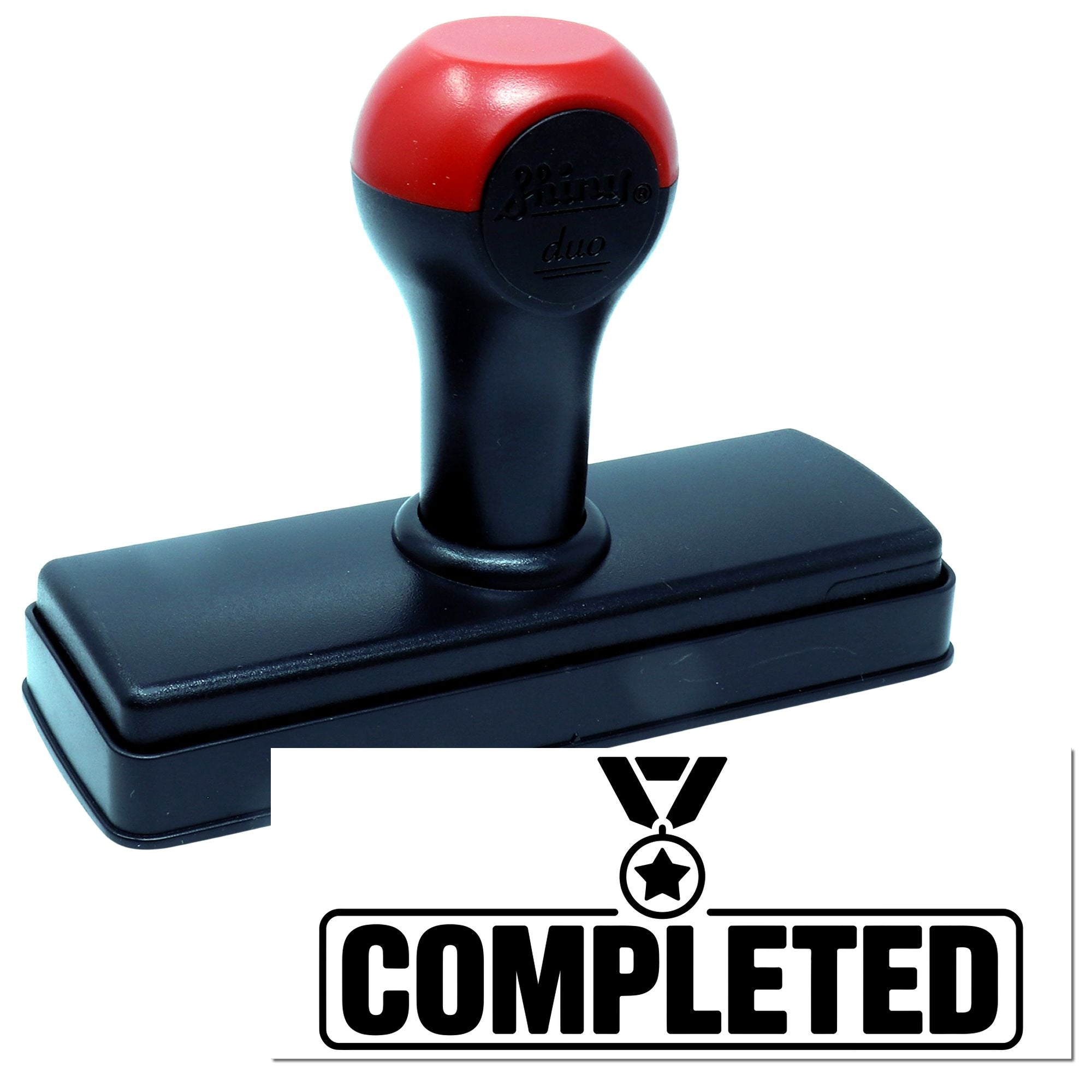 Self-inking rubber stamp with COMPLETED imprint for office approval and document tracking.