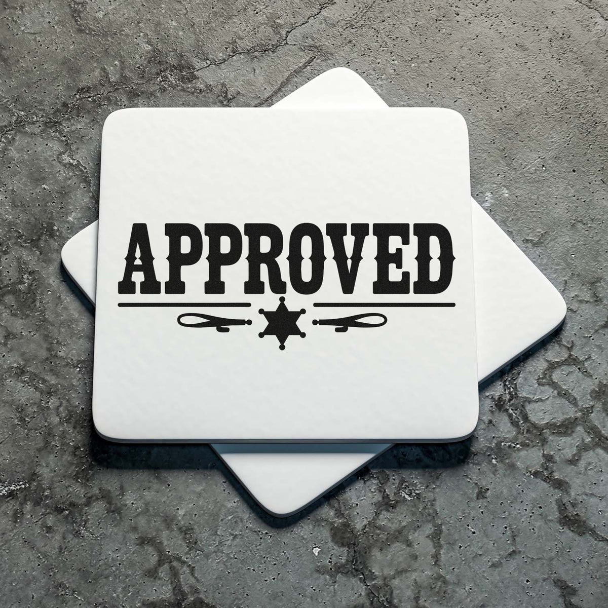 Approved rubber stamp with bold black text and decorative star emblem on a square block for office, business, or custom stamping.