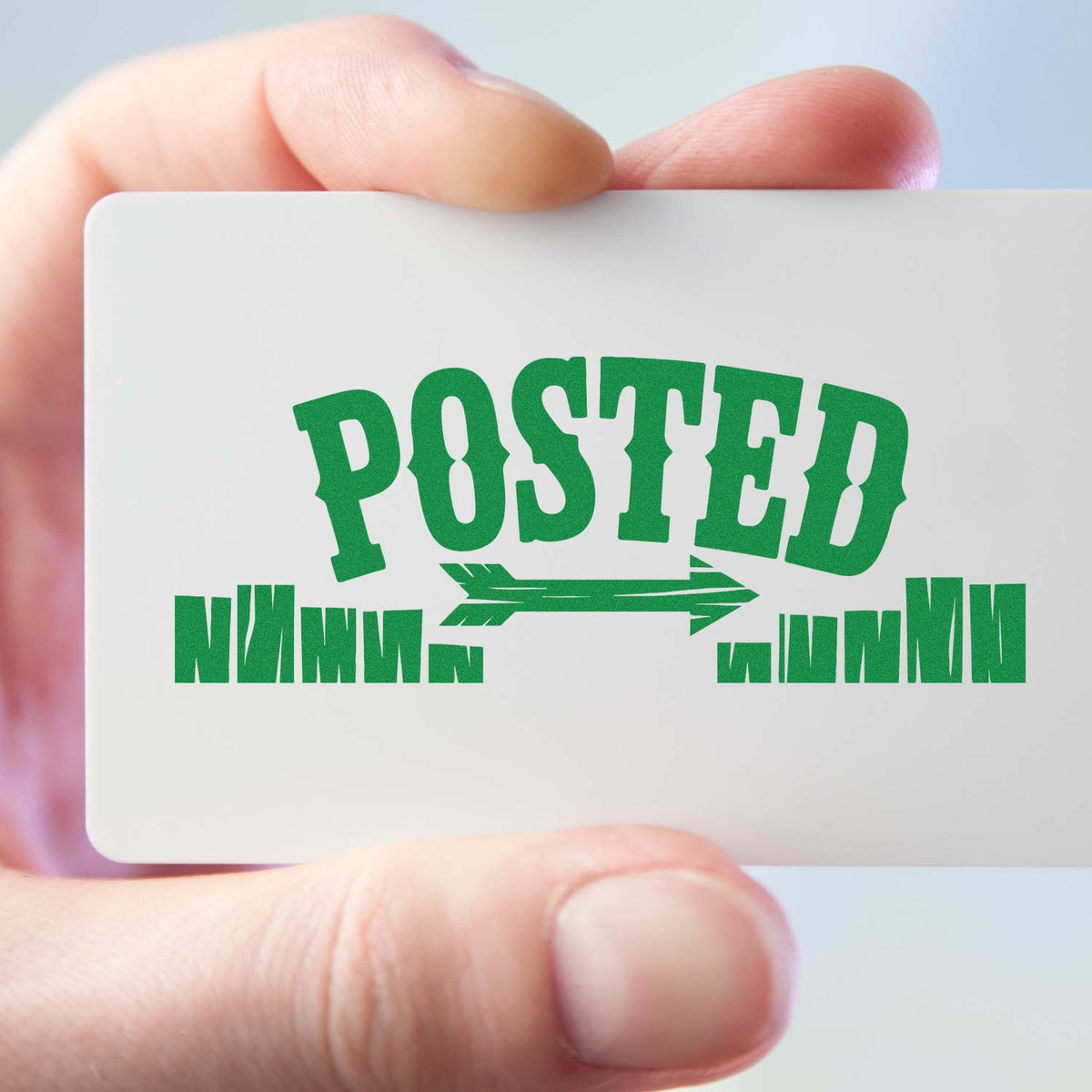 Posted rubber stamp impression on a card, ideal for mail, shipping, and office document processing.