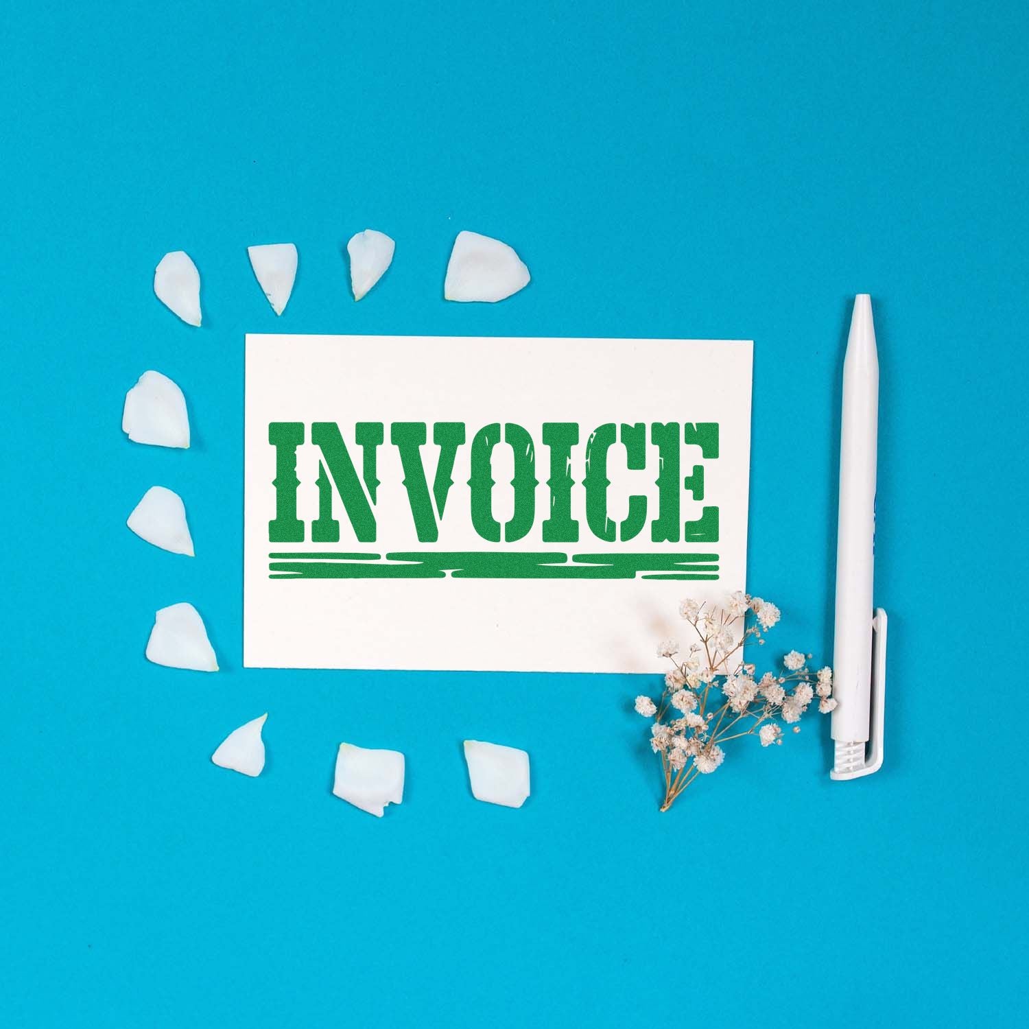 Invoice rubber stamp mockup with green text on a white card, featuring a pen and floral accents on a blue background.
