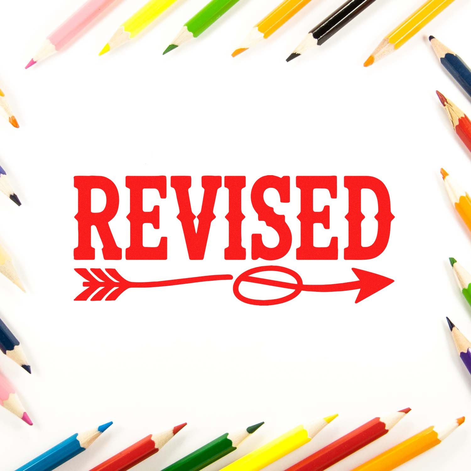 Red REVISED rubber stamp graphic with arrow, framed by colored pencils on white background