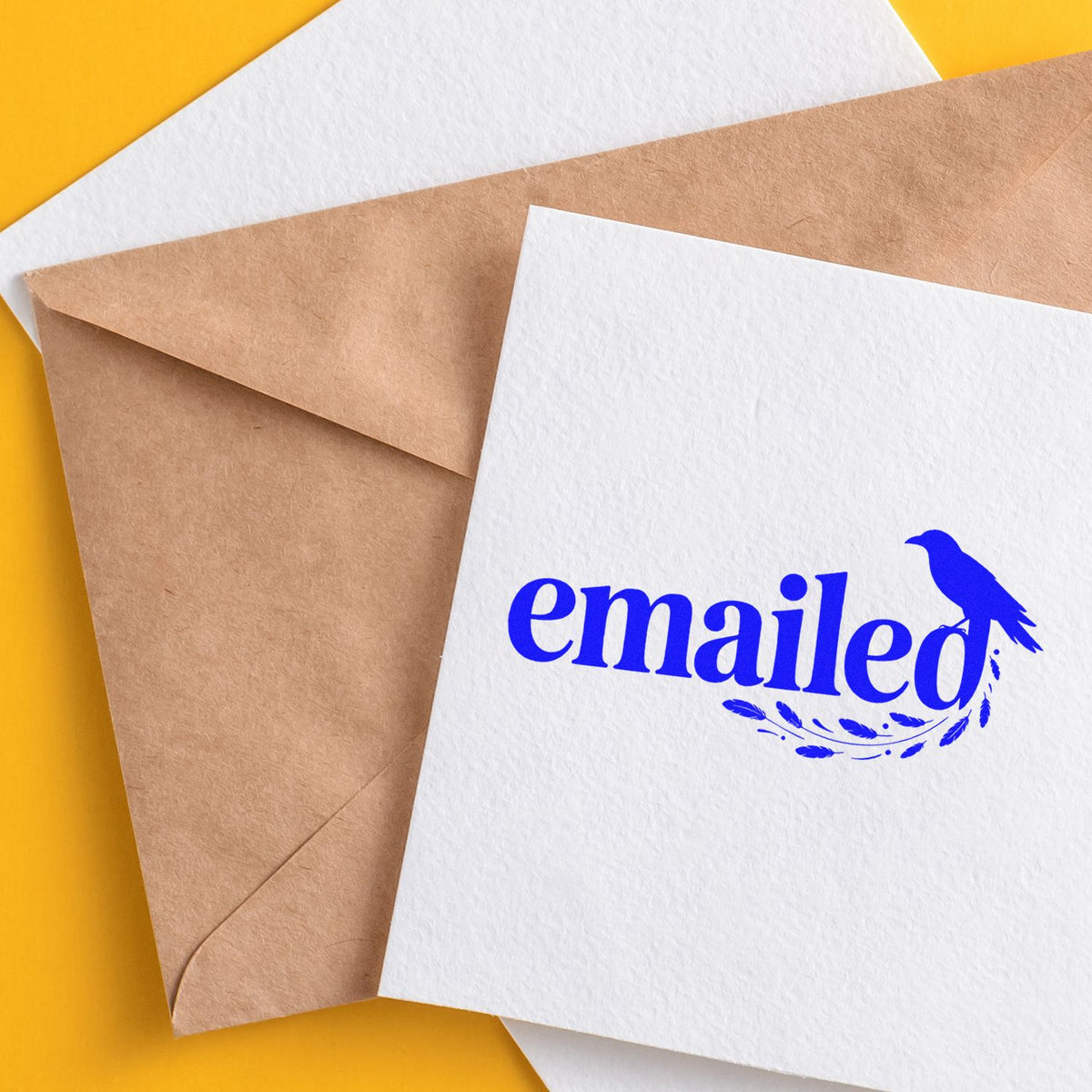 Blue emailed rubber stamp on envelopes, perfect for office mail, correspondence, and custom business stamping.