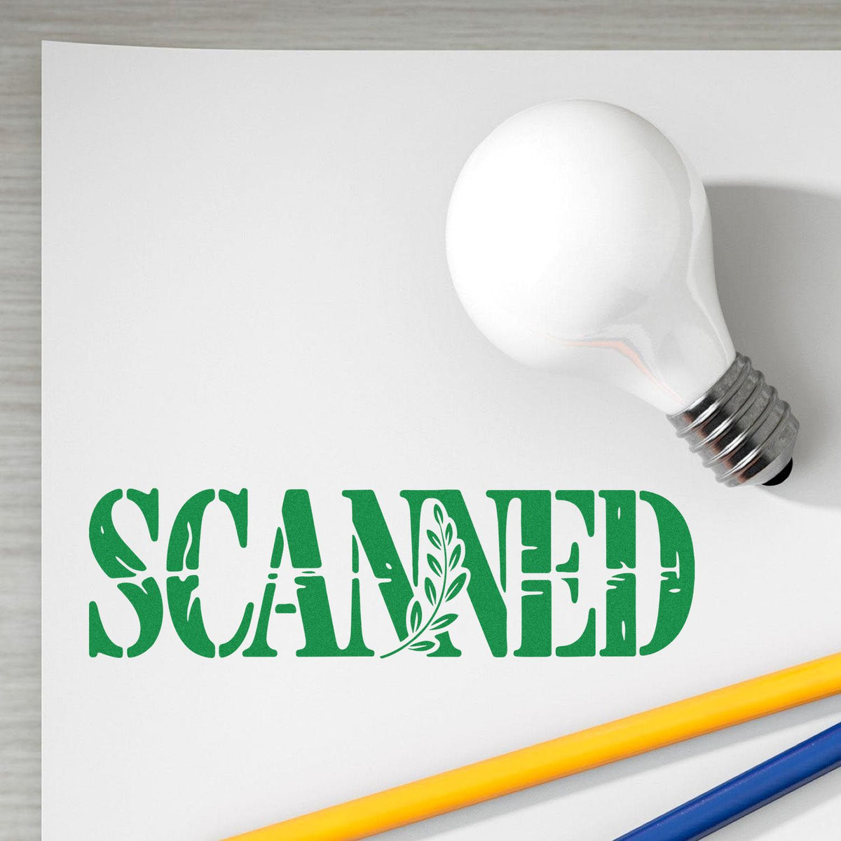 Custom rubber stamp design with green SCANNED text for document marking, office record processing, and mail sorting.