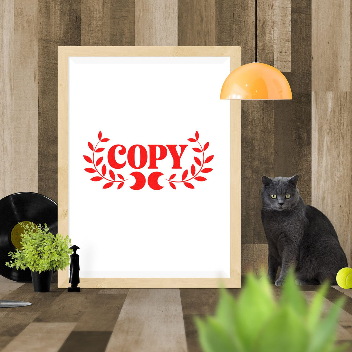 Red COPY rubber stamp design mockup with decorative leaf accents on framed print for office and stationery use.
