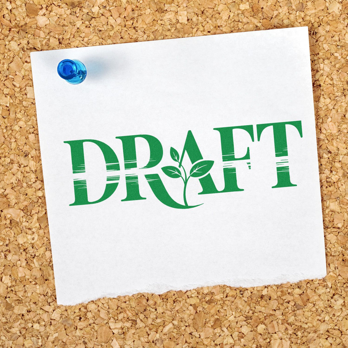 Green DRAFT rubber stamp on a pinned note, marking a document as a draft or preliminary proof.