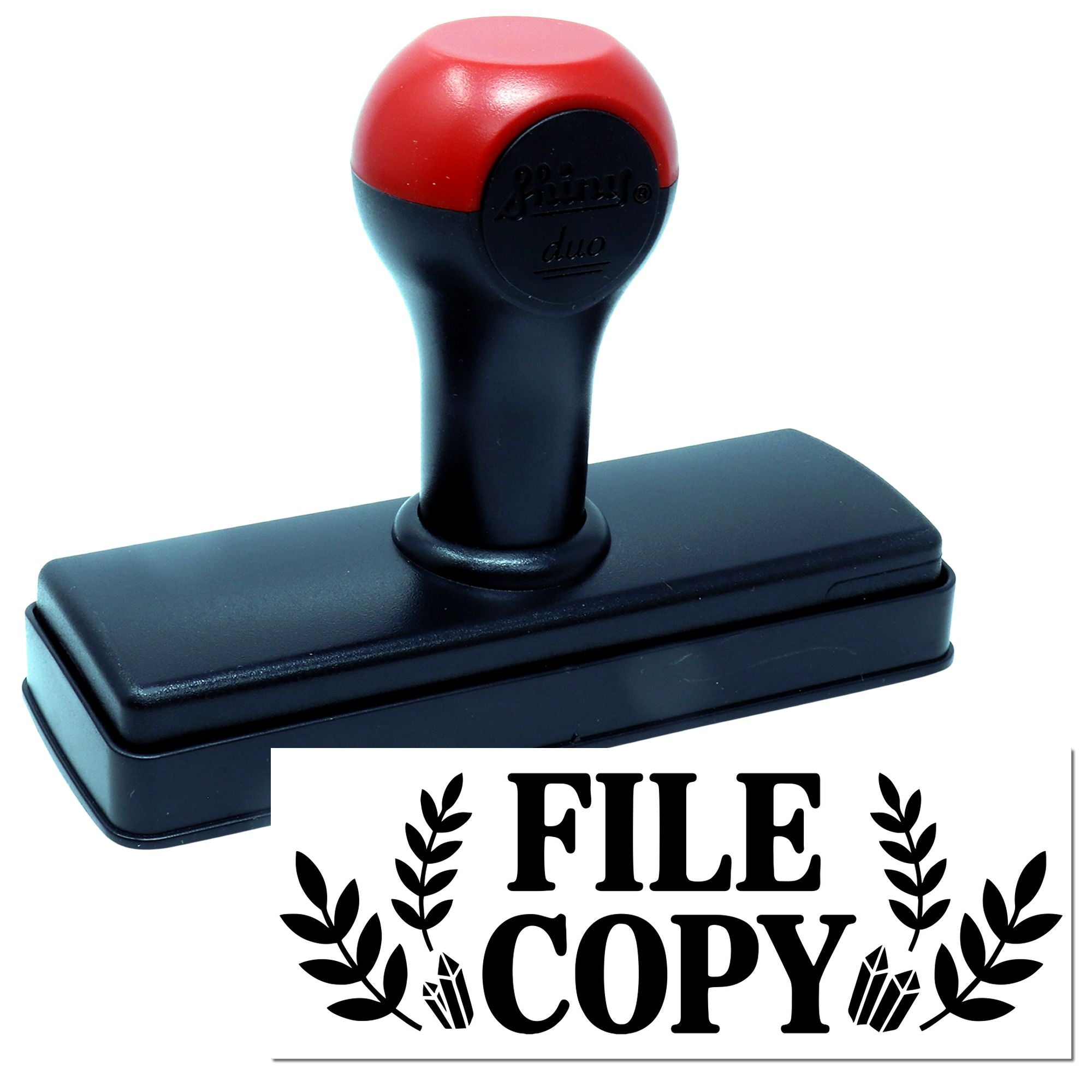 Self-inking rubber stamp for marking documents "FILE COPY" in office filing.