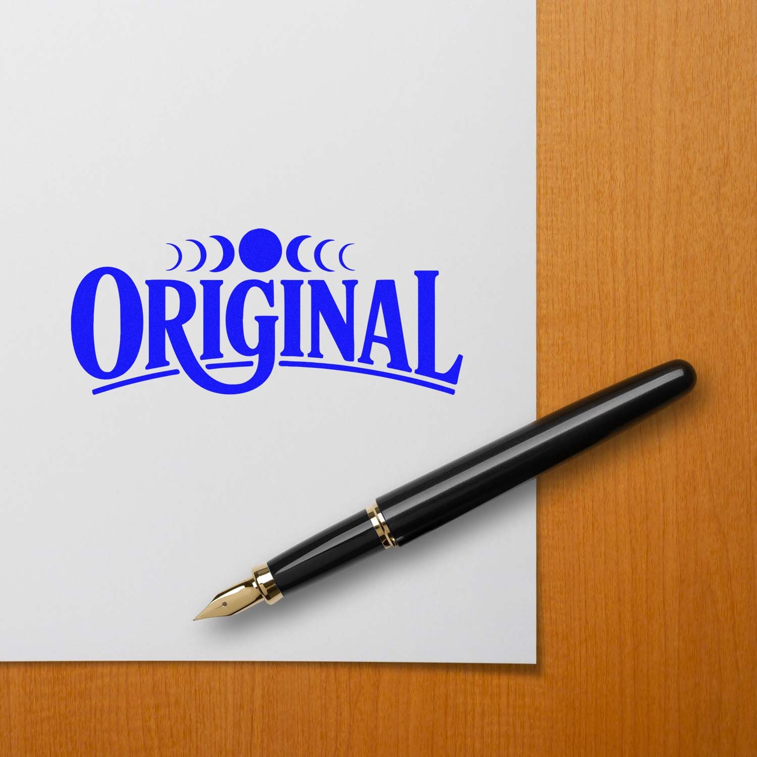 Blue ORIGINAL rubber stamp impression on paper with fountain pen, for document marking, approvals, and office use.