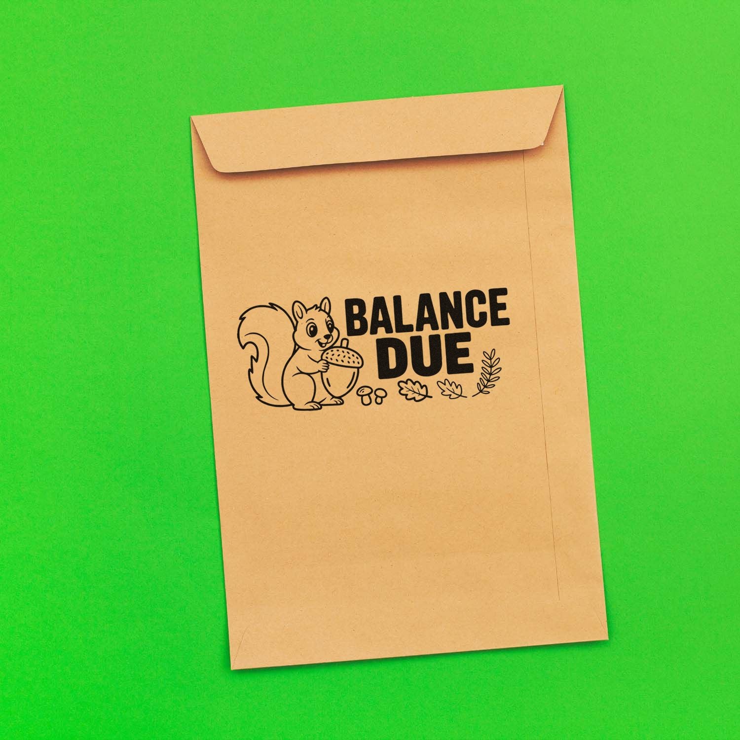 Balance Due rubber stamp on kraft envelope with squirrel and acorn graphic for billing or reminder mail.