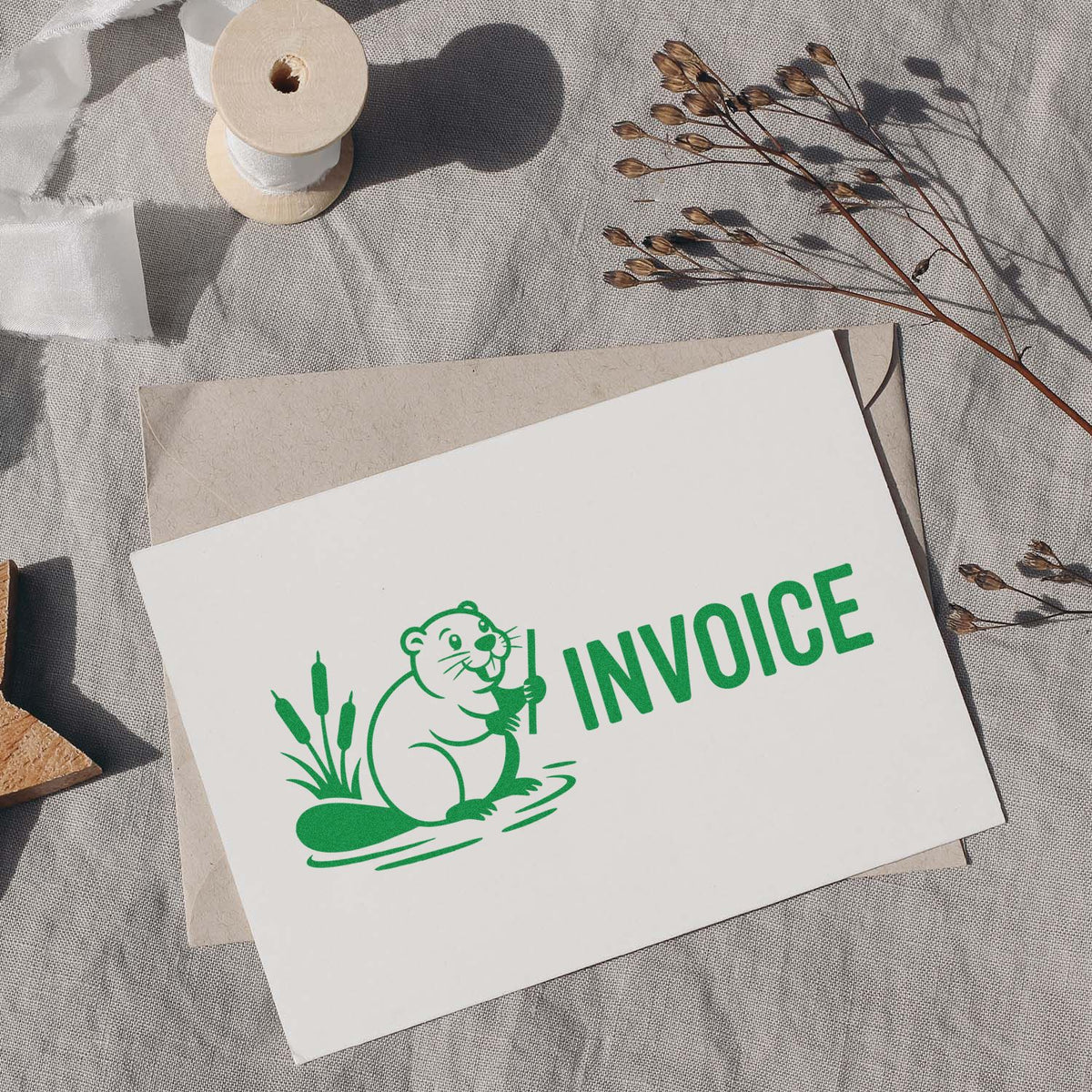 Green invoice rubber stamp with otter logo, ideal for business billing, paperwork, and branded document marking.