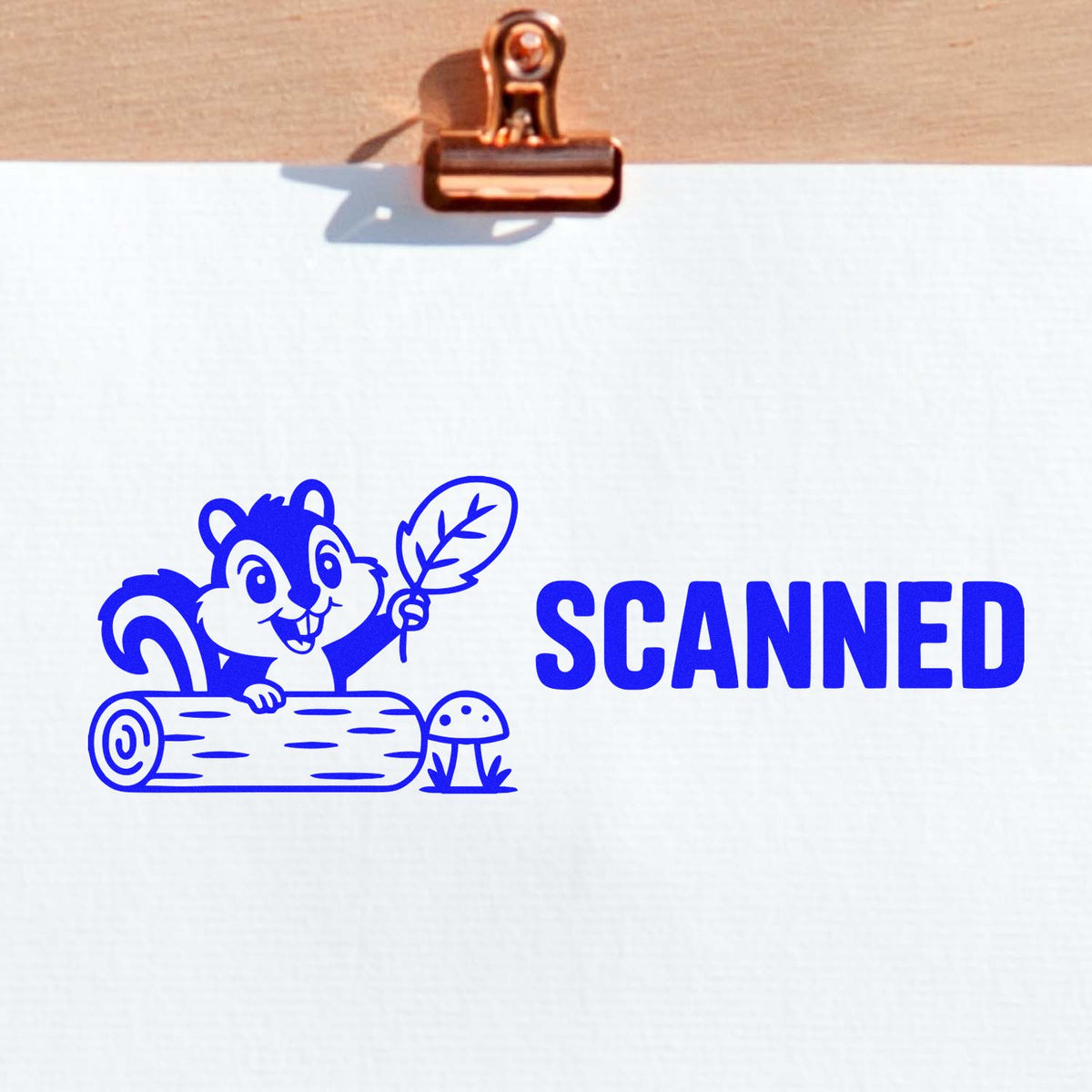 Blue Scanned rubber stamp design with squirrel illustration for document tracking and office filing.
