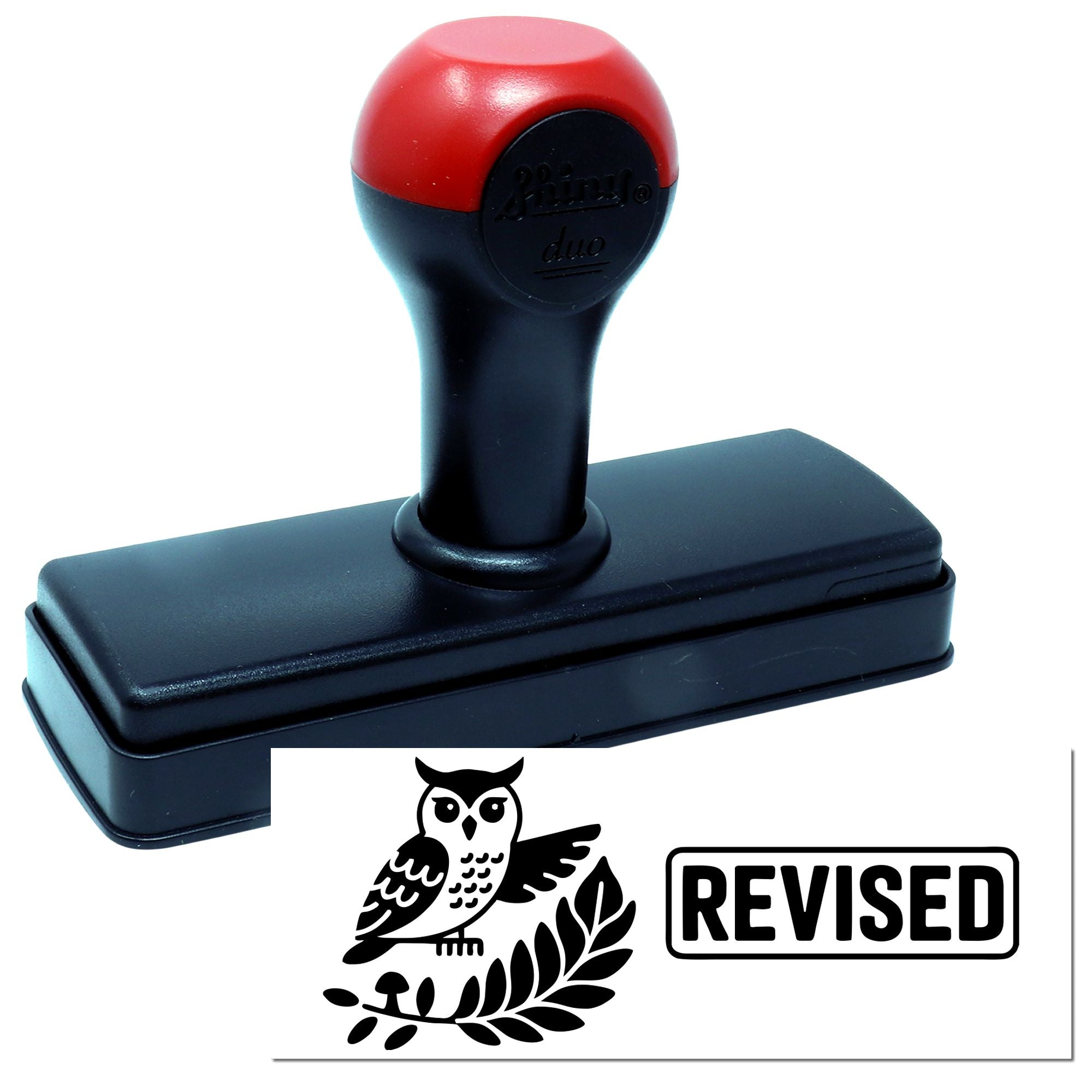 Self-inking rubber stamp with owl and REVISED imprint for office document approval and review marking