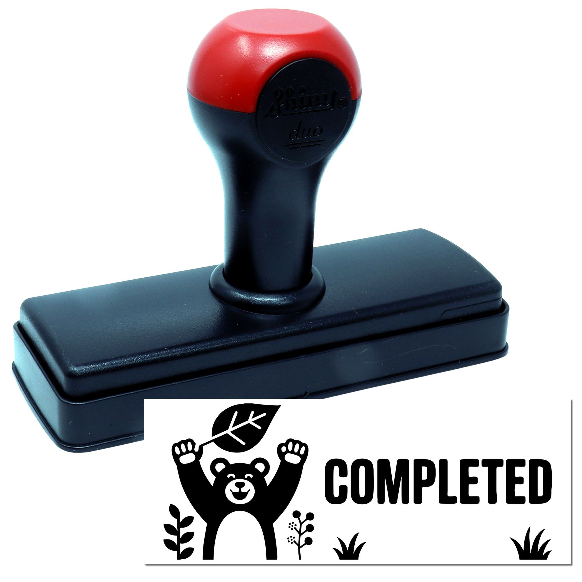 Self-inking rubber stamp with COMPLETED bear logo imprint for office, teacher, or craft marking.