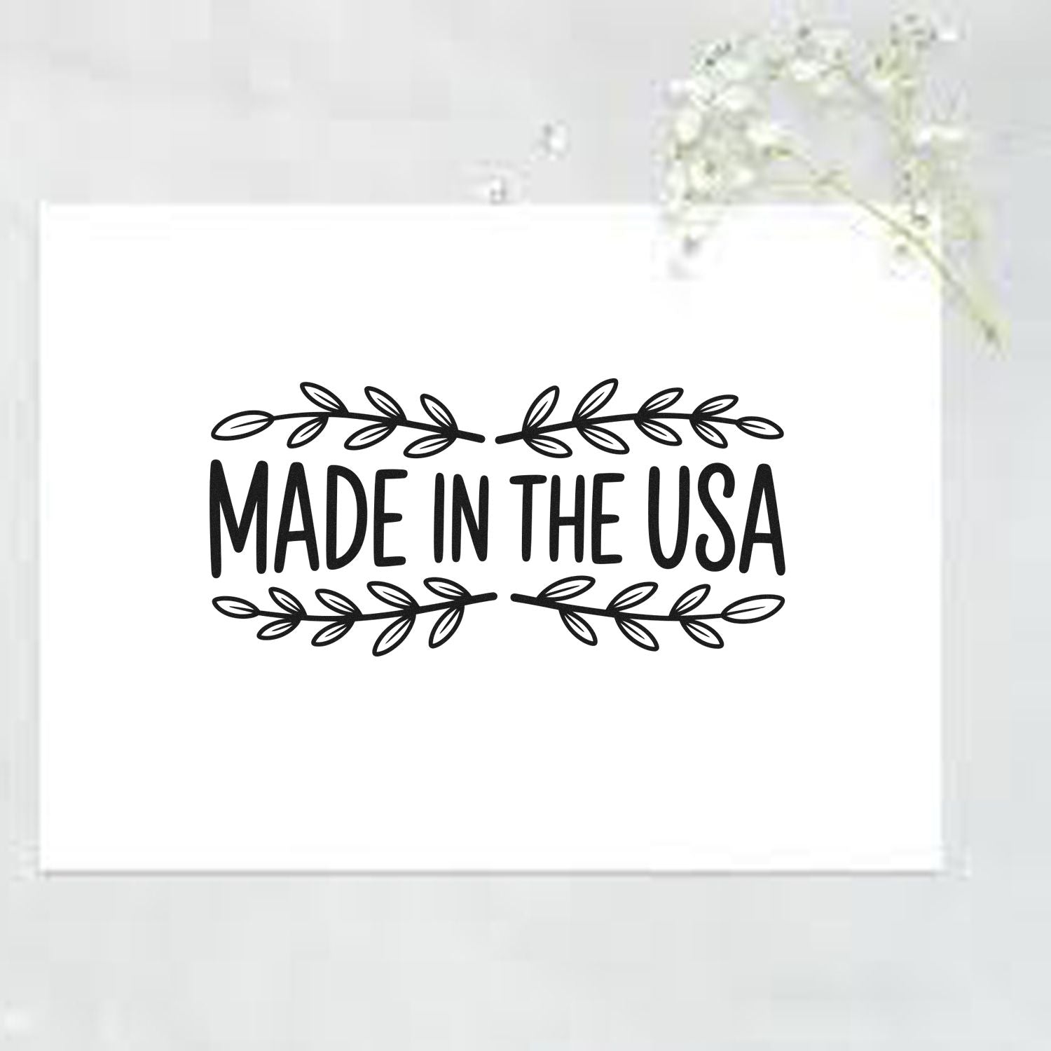 Made in the USA rubber stamp with decorative leaf border for handmade packaging, branding, and patriotic product labeling.