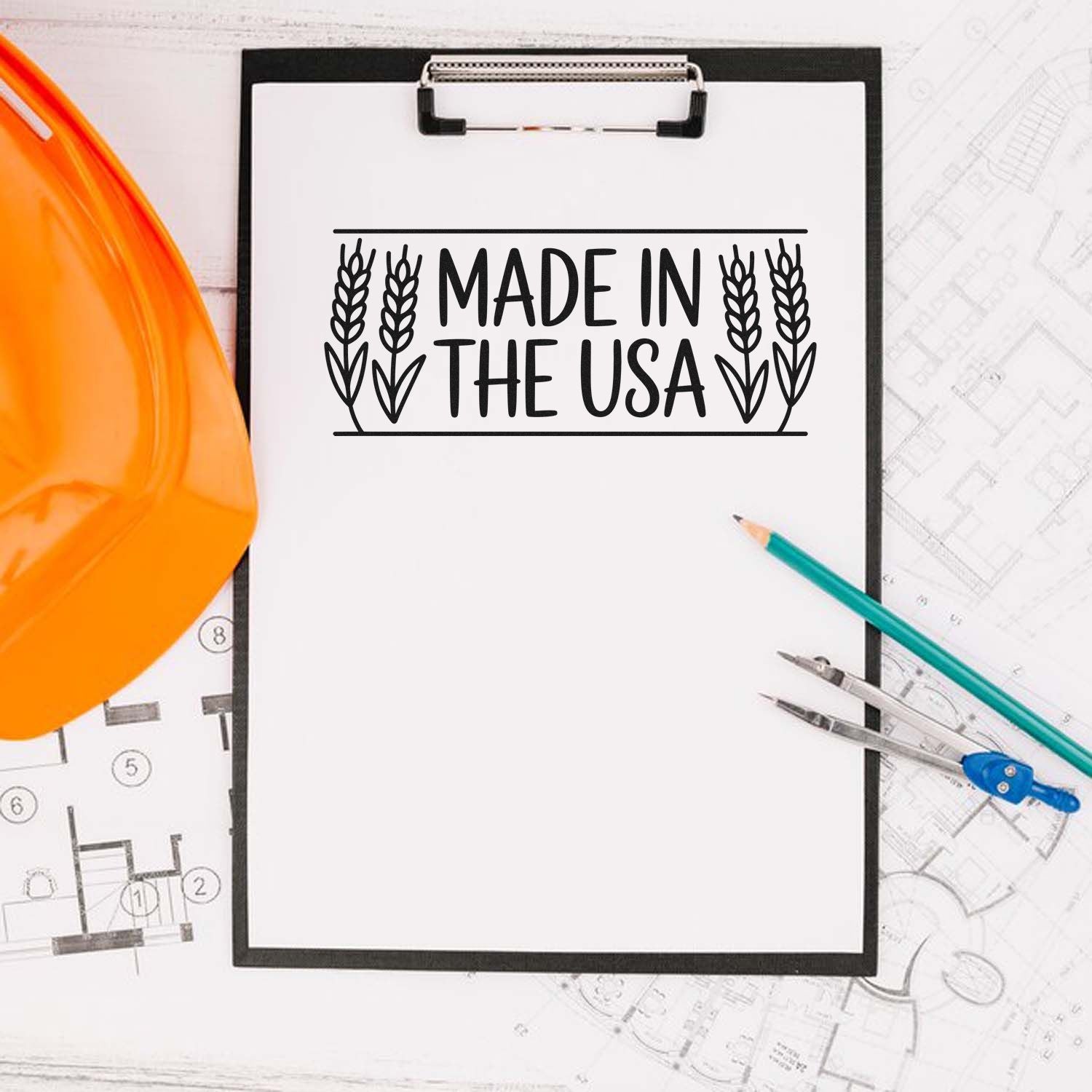 Made in the USA rubber stamp design on clipboard with blueprint, hard hat, and drafting tools for construction branding.