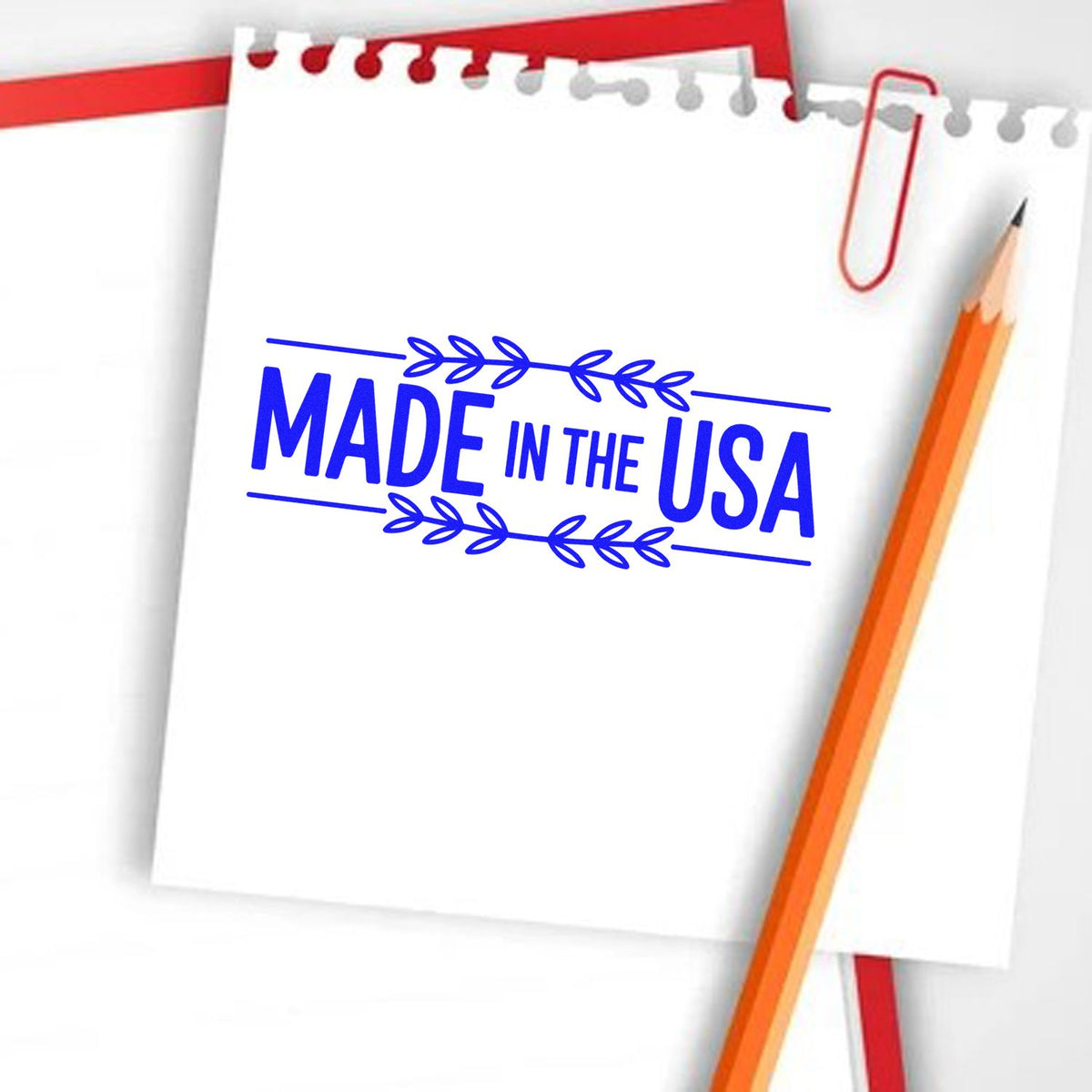 Made in USA rubber stamp imprint on paper with pencil, ideal for custom branding, product packaging, and labels.