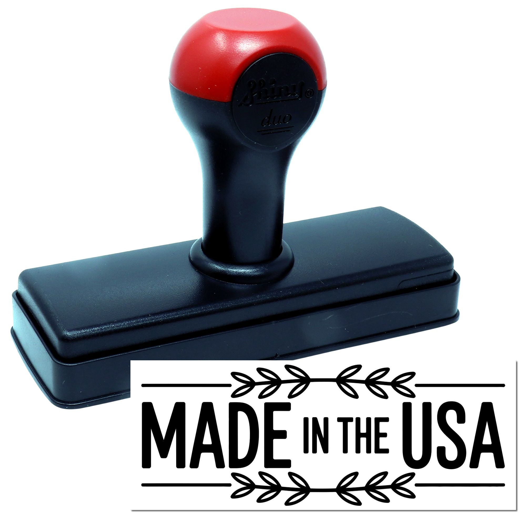 Self-inking rubber stamp with Made in the USA design for packaging, branding, and product labeling.