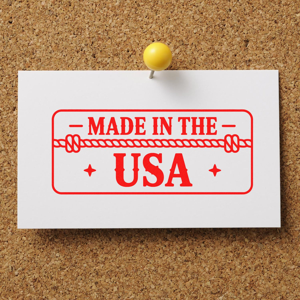 Made in the USA rubber stamp on a pinned white card, ideal for product packaging and patriotic branding.