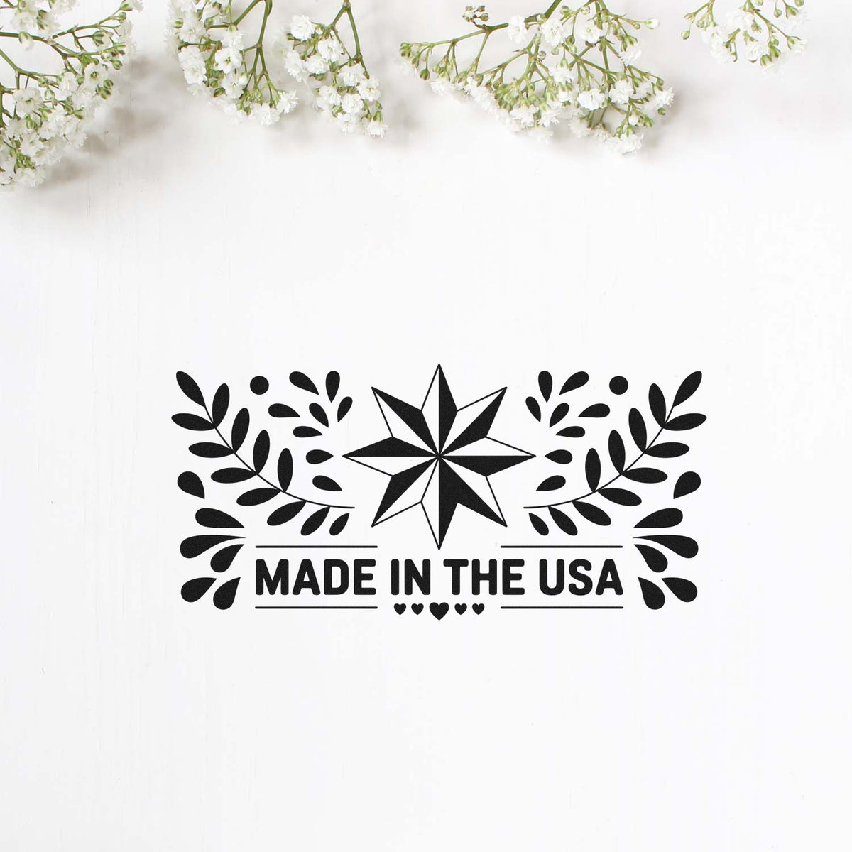Made in the USA rubber stamp design with star and leaf accents for handmade product branding and packaging.