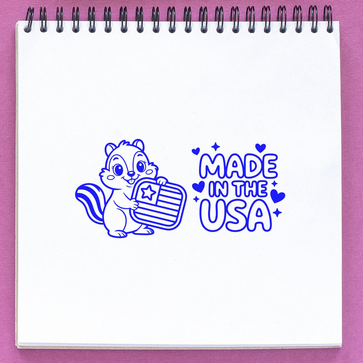 Made in the USA rubber stamp design with a squirrel holding an American flag, perfect for patriotic packaging and crafts.