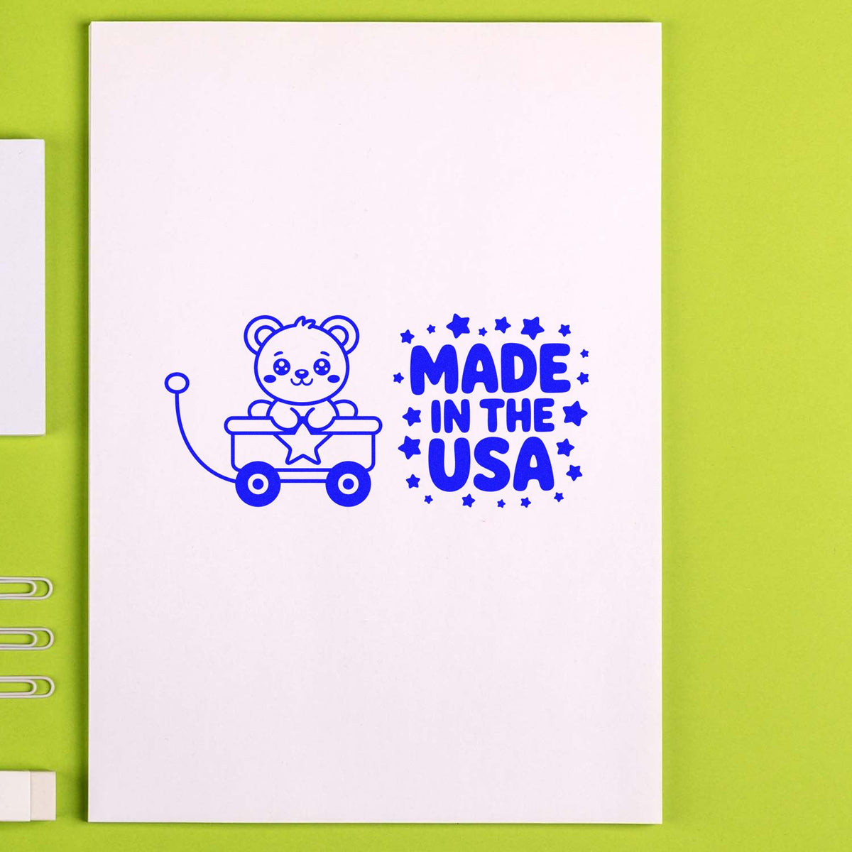 Made in the USA rubber stamp with cute bear in wagon design, perfect for patriotic handmade packaging and craft branding.