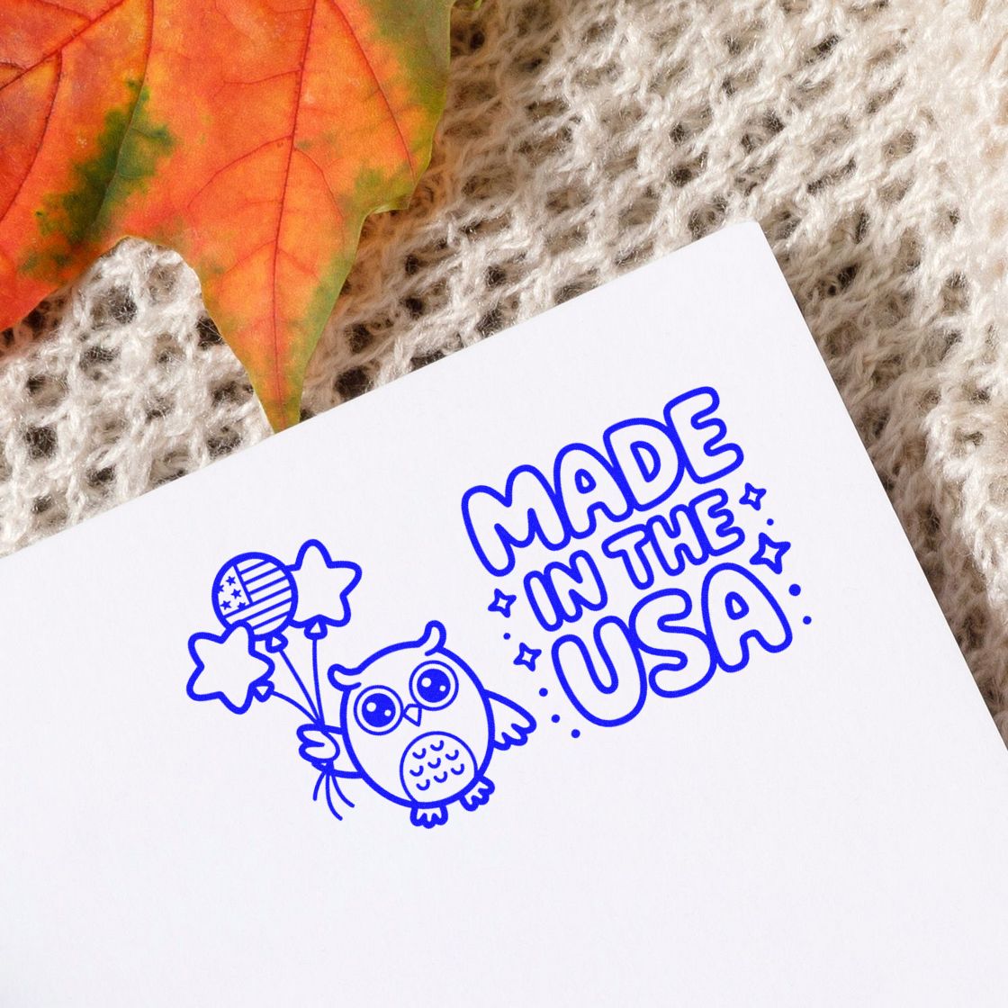 Made in the USA rubber stamp design with owl and stars on paper, ideal for patriotic packaging and handmade products.
