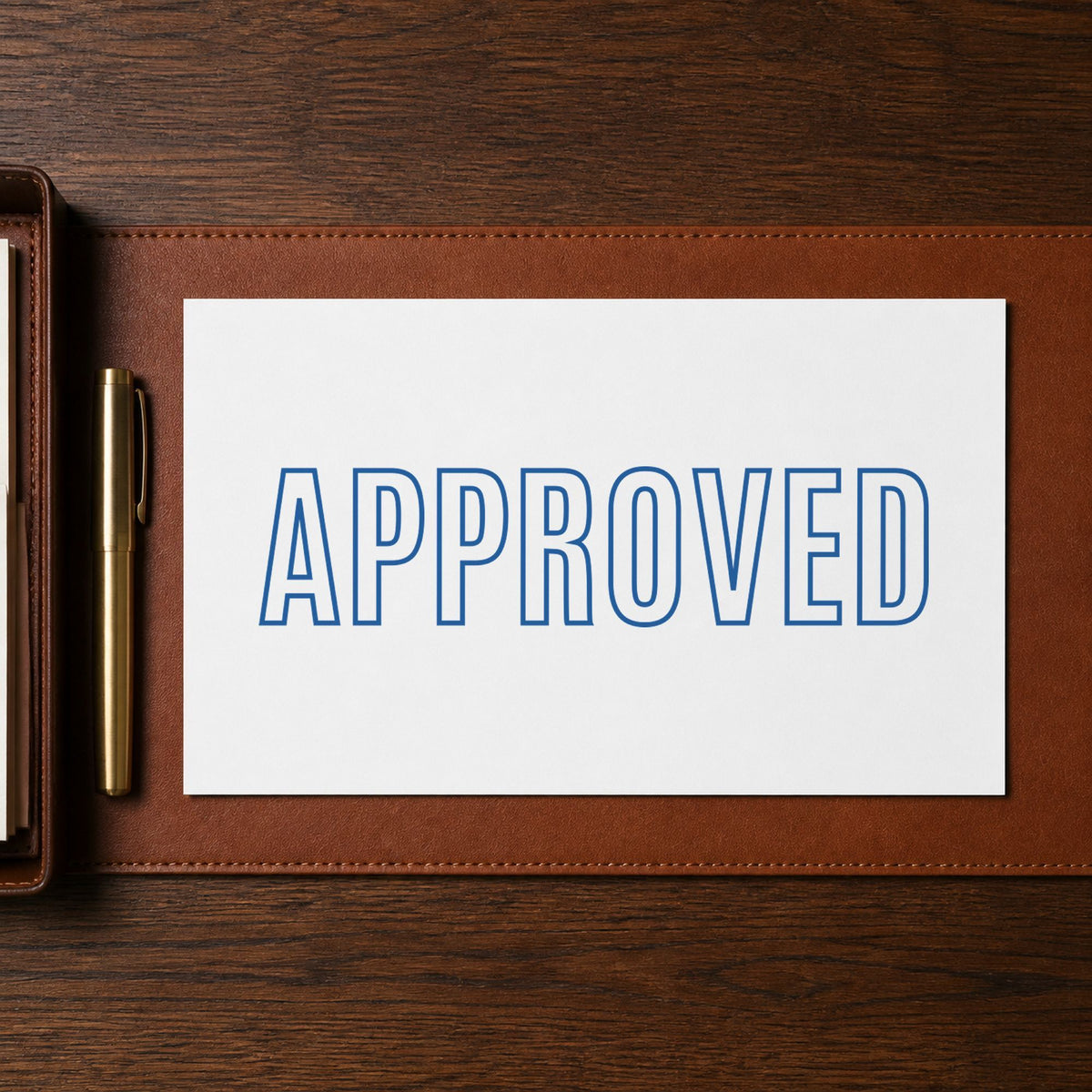 Marking a page "Approved" with the Xstamper Approved Stamp