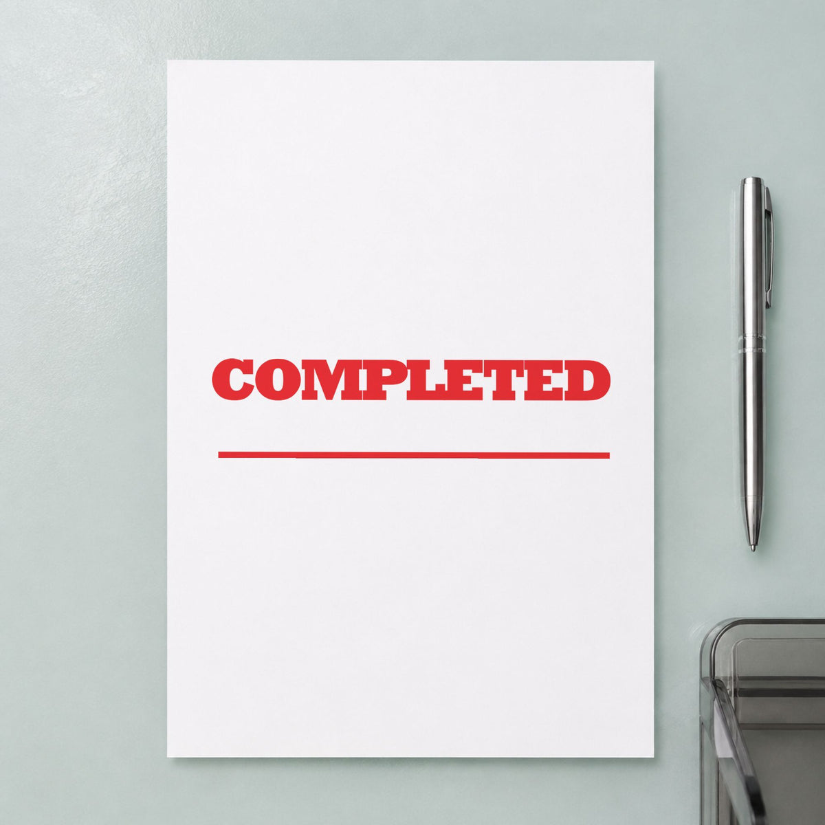 "Completed" imprint stamped on a document with the Completed Stamp – Red Pre-Inked Xstamper