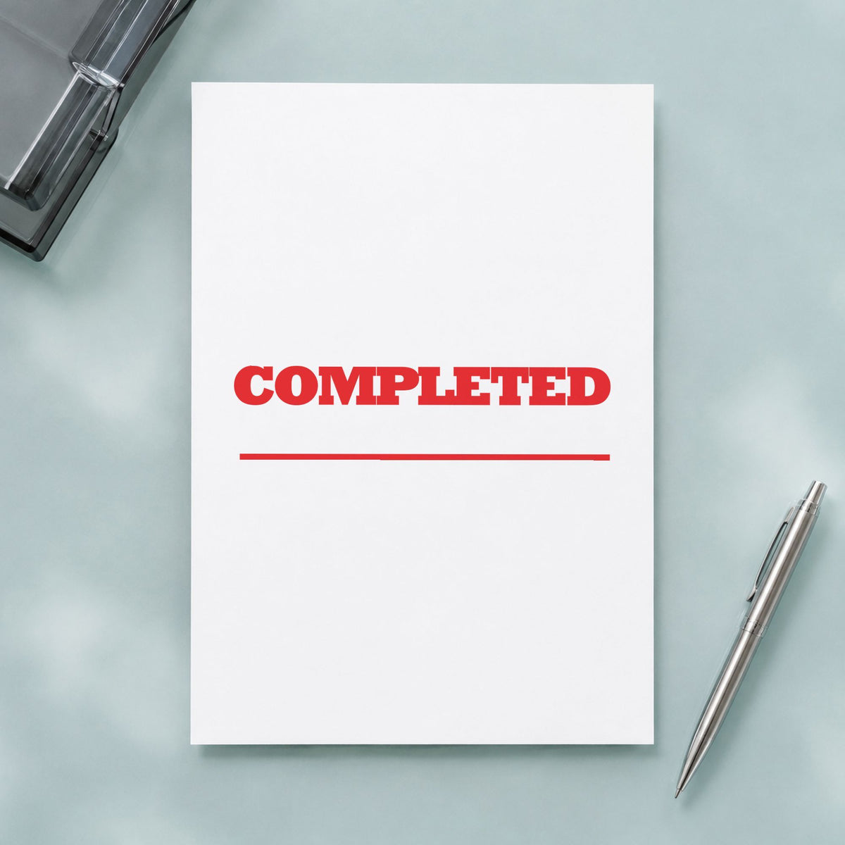 Completed Stamp – Red Pre-Inked Xstamper leaving a clean "Completed" impression