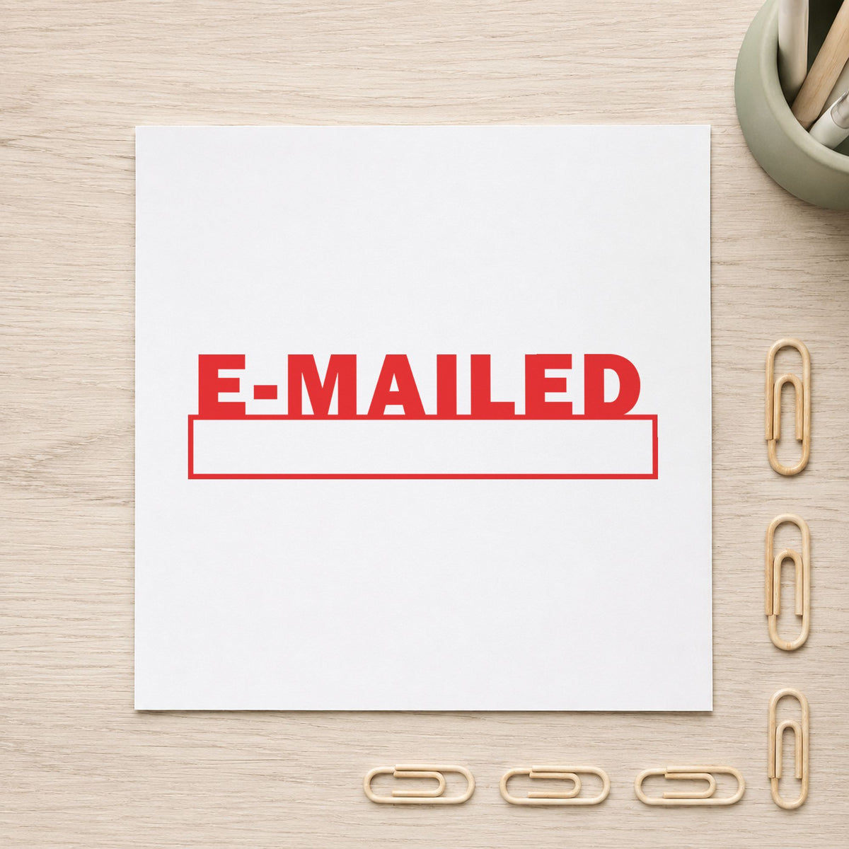 E-Mailed Stamp leaving a clean "E-mailed" impression