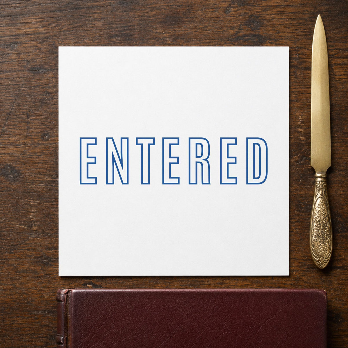 "Entered" imprint at 1/2 x 1-5/8 in, no separate ink pad required