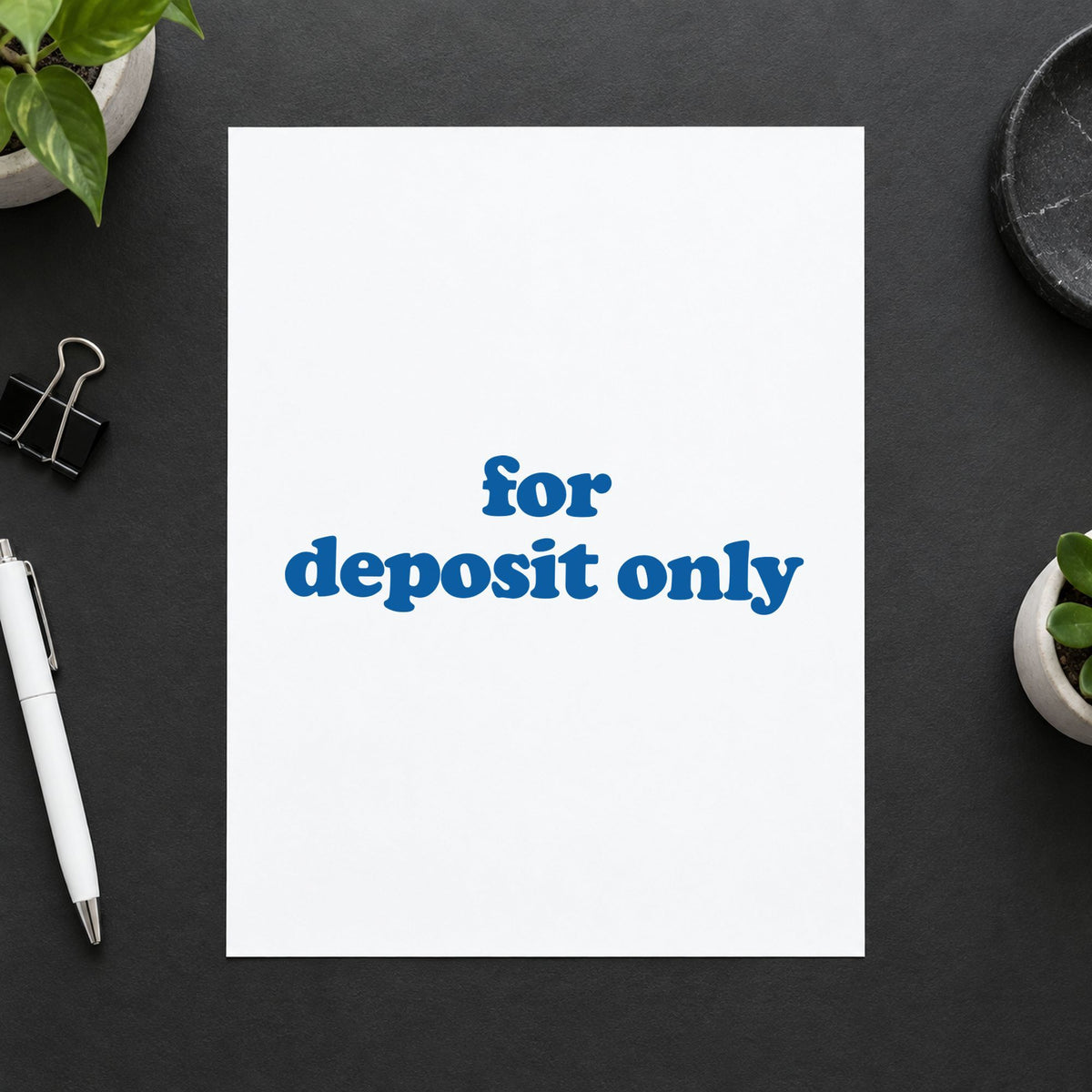 "For deposit only" impression shown close up, rectangular imprint at 1/2 x 1-5/8 in