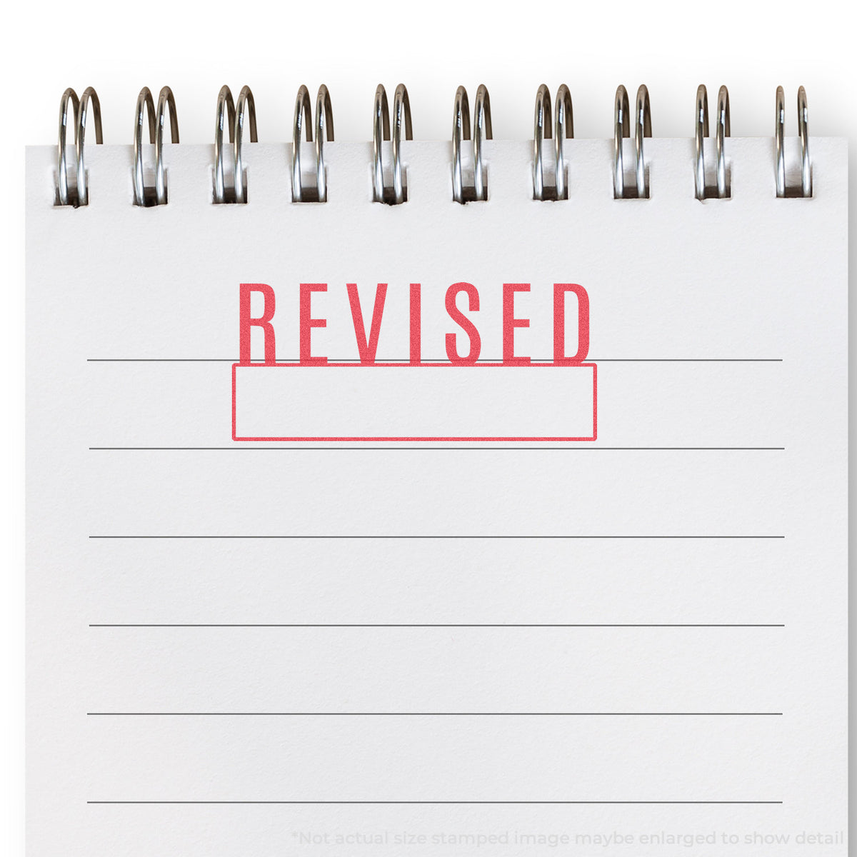 "Revised" mark stamped for document handling, Xstamper 1219 stamp