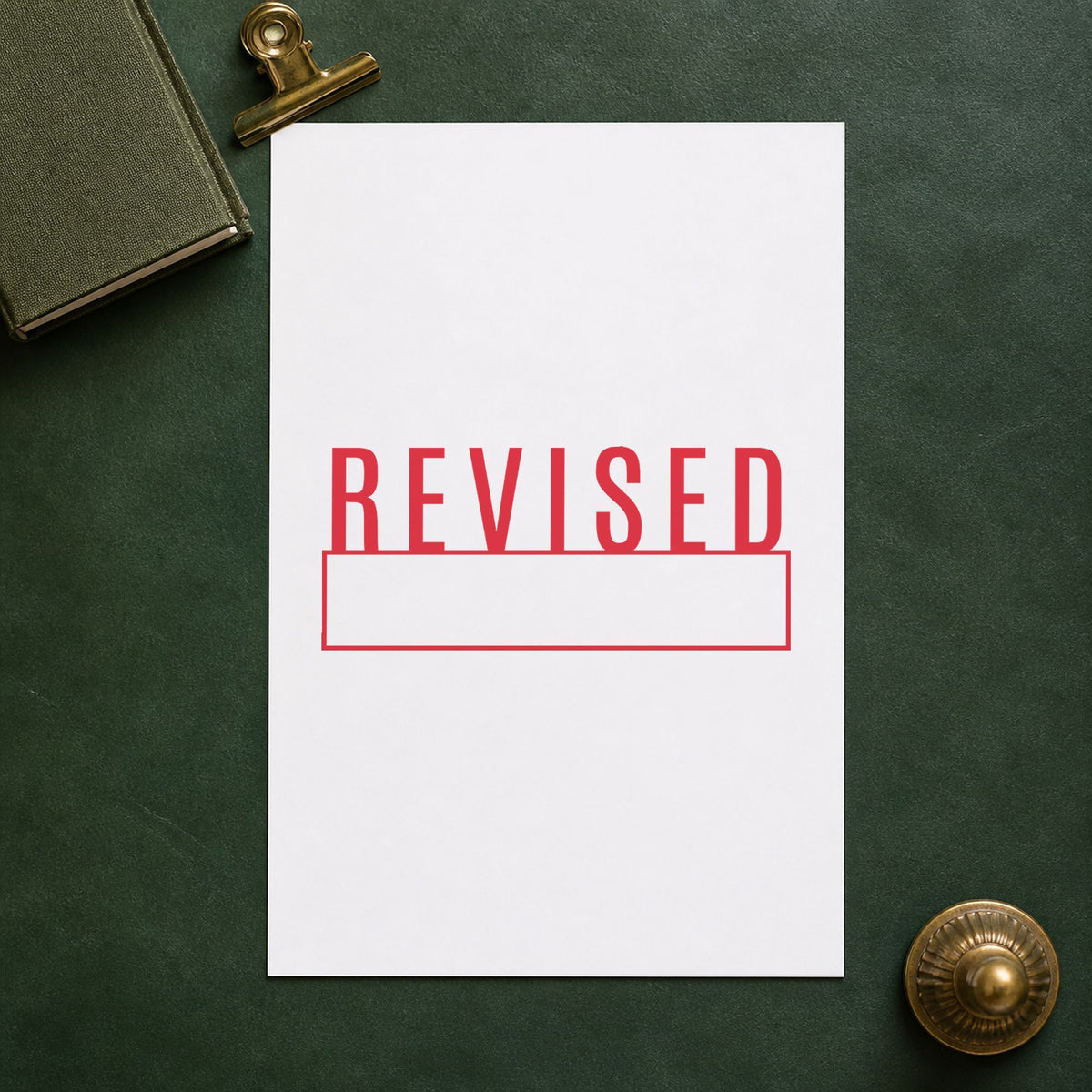 Crisp "Revised" imprint produced by the Xstamper Revised Stamp