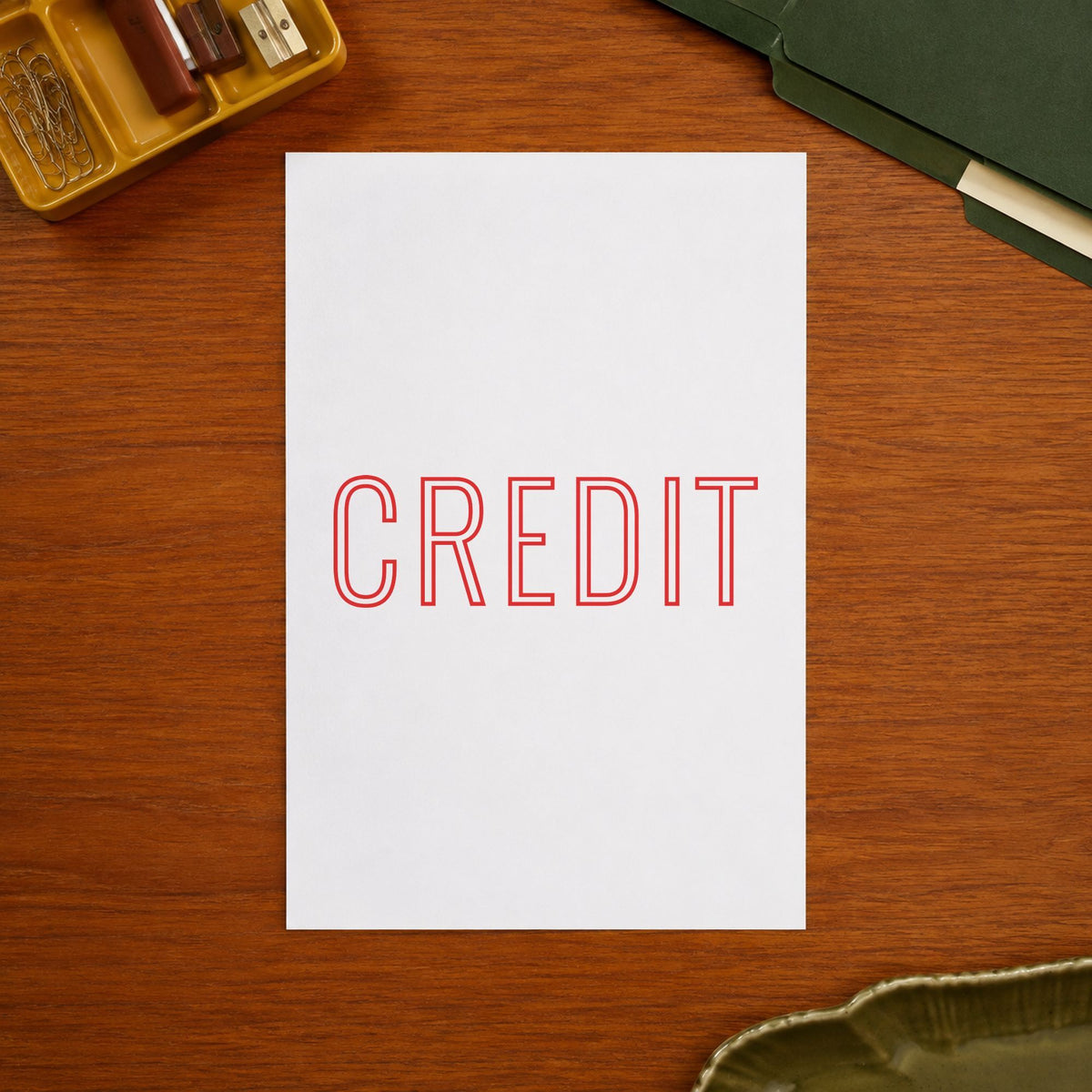 Marking a page "Credit" with the Xstamper Credit Accounting Stamp