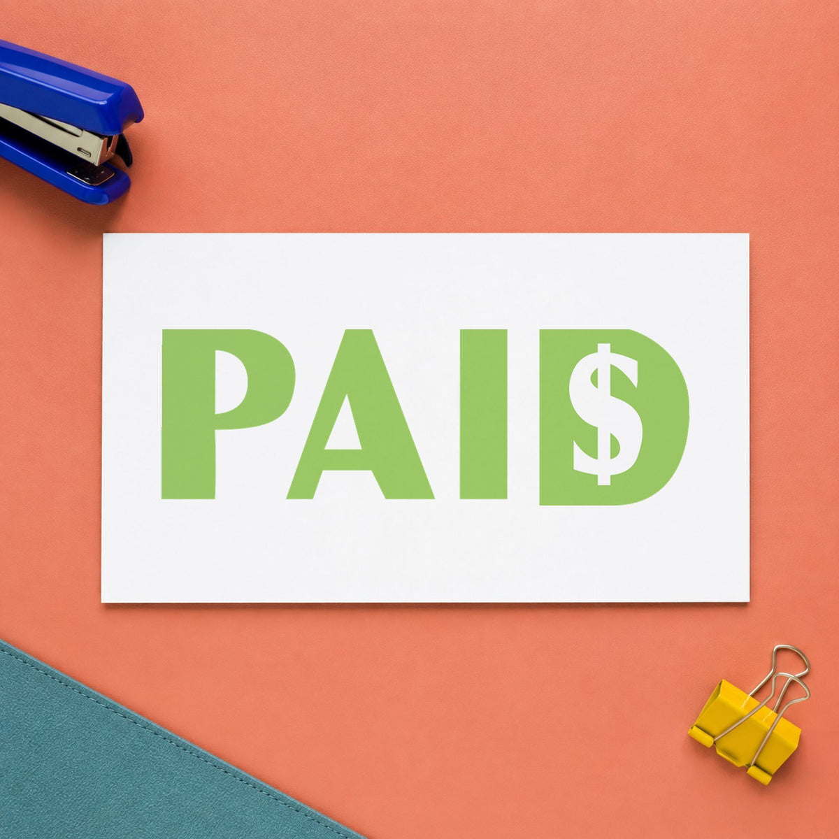 "Paid" imprint stamped on a document with the Green Paid Accounting Stamp