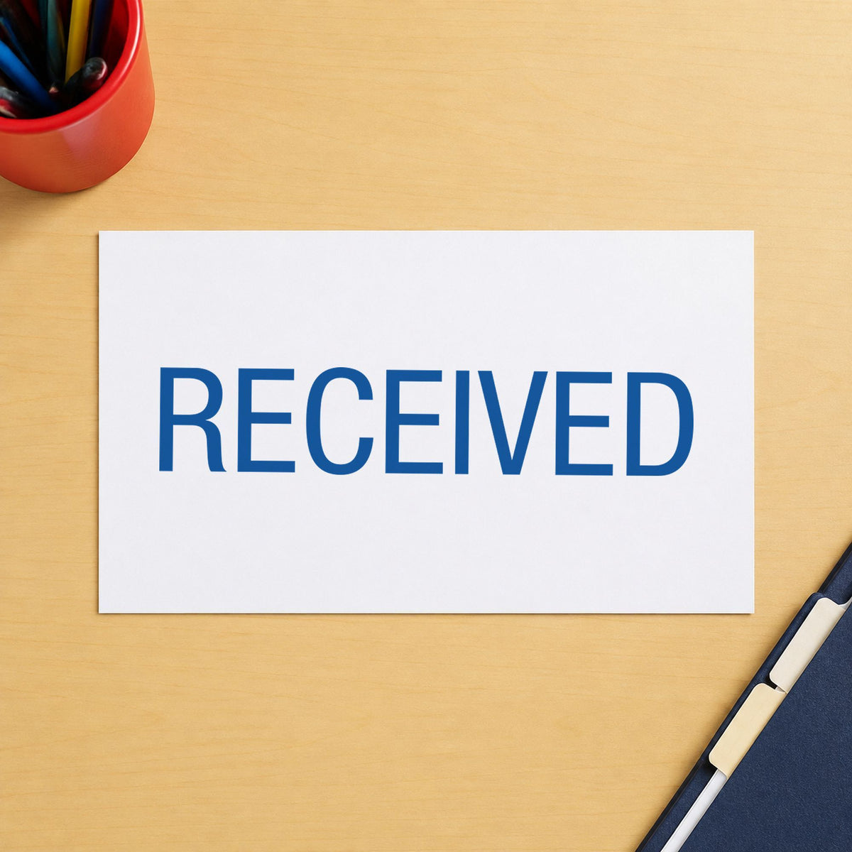 Marking a page "Received" with the Dark Blue Received Document Stamp