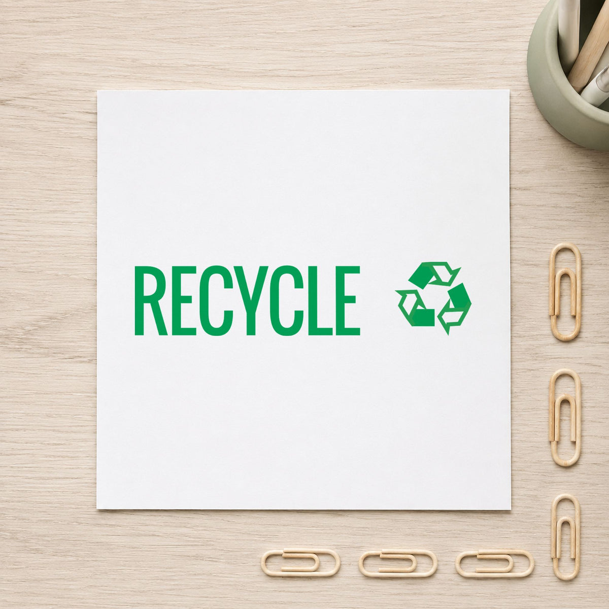 "Recycle" imprint stamped on a document with the Green Recycle Instruction Stamp