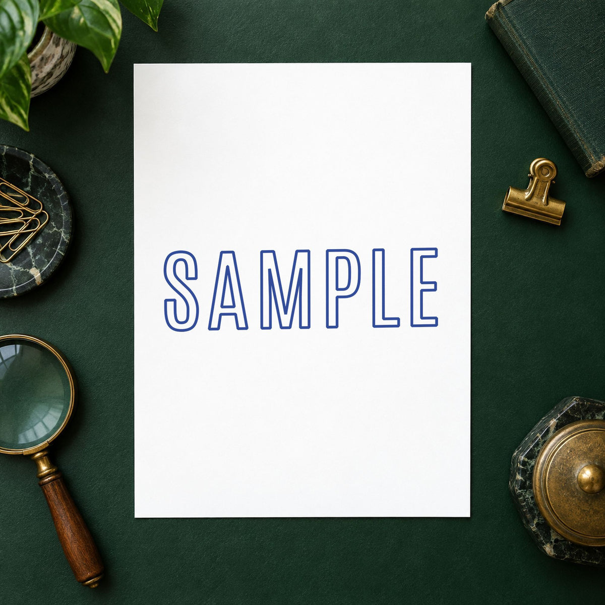 "Sample" stamp impression made with pre-inked Xstamper 1002