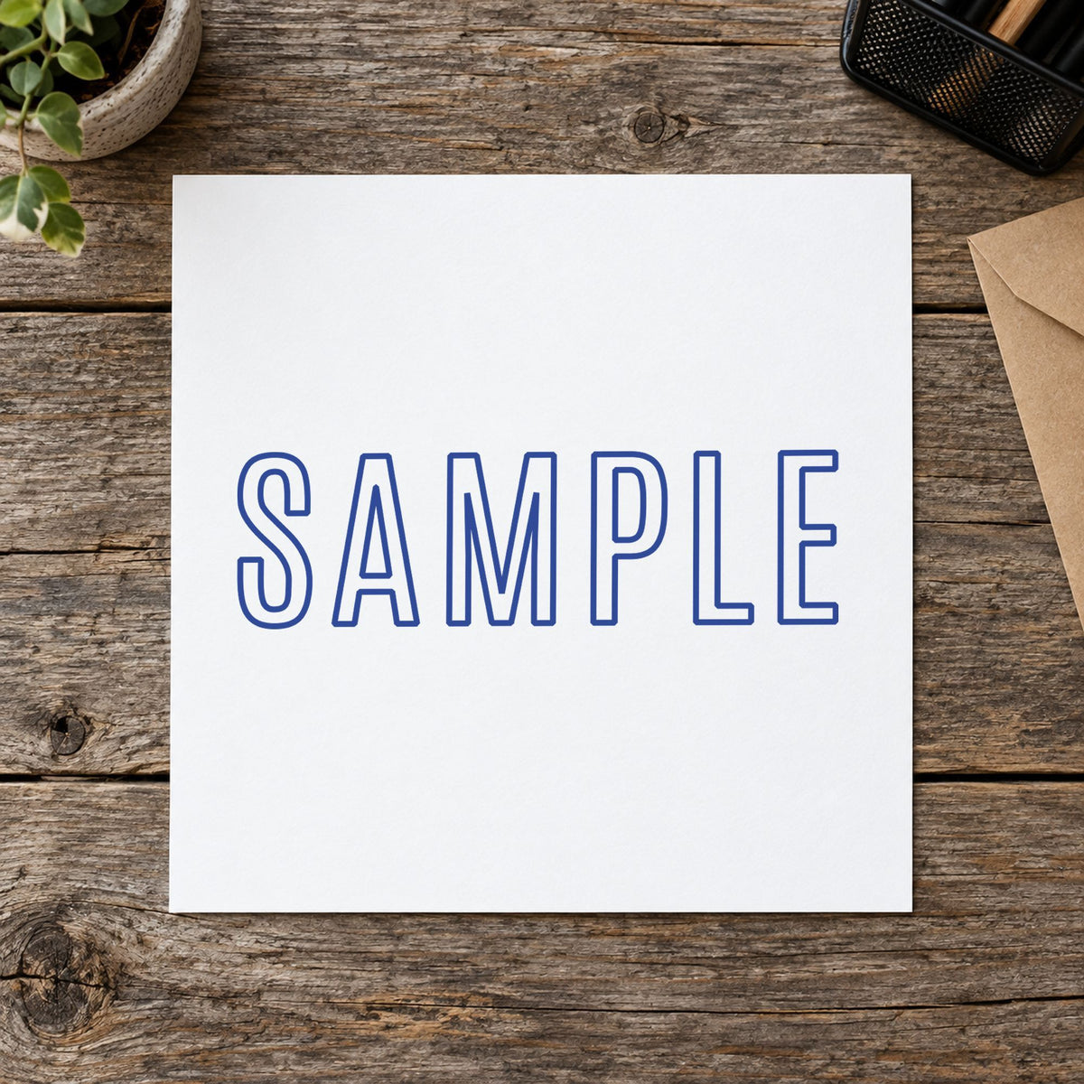 Marking a page "Sample" with the Xstamper Sample Document Stamp