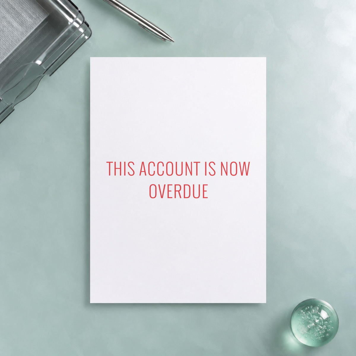 "This account is now overdue" stamp mark in everyday office use, Xstamper 1344