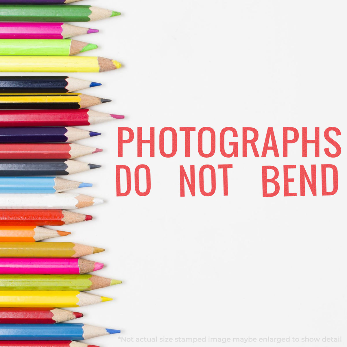 "Photographs do not bend" mark stamped for document handling, Xstamper 3242 stamp