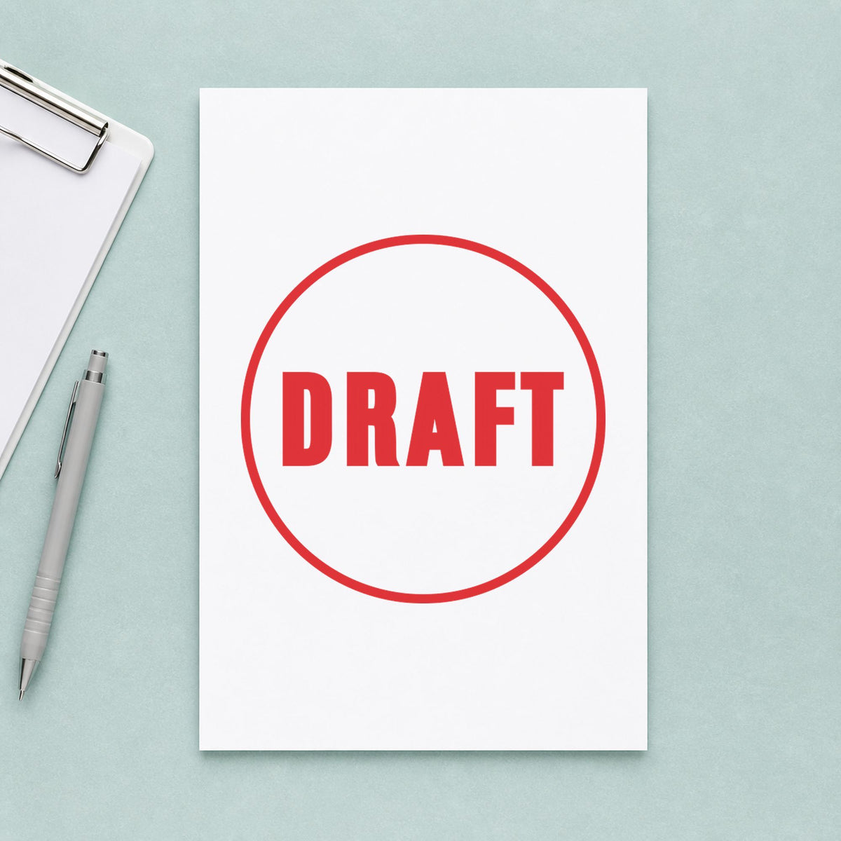 Marking a page "Draft" with the Round Draft Stamp