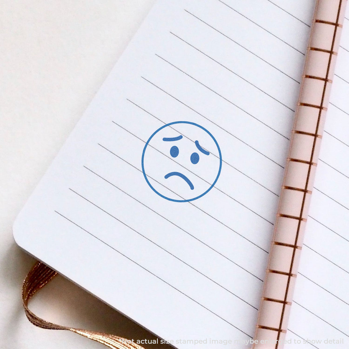 "Frown face" imprint used to flag items for handling, Round Frown Face Stamp