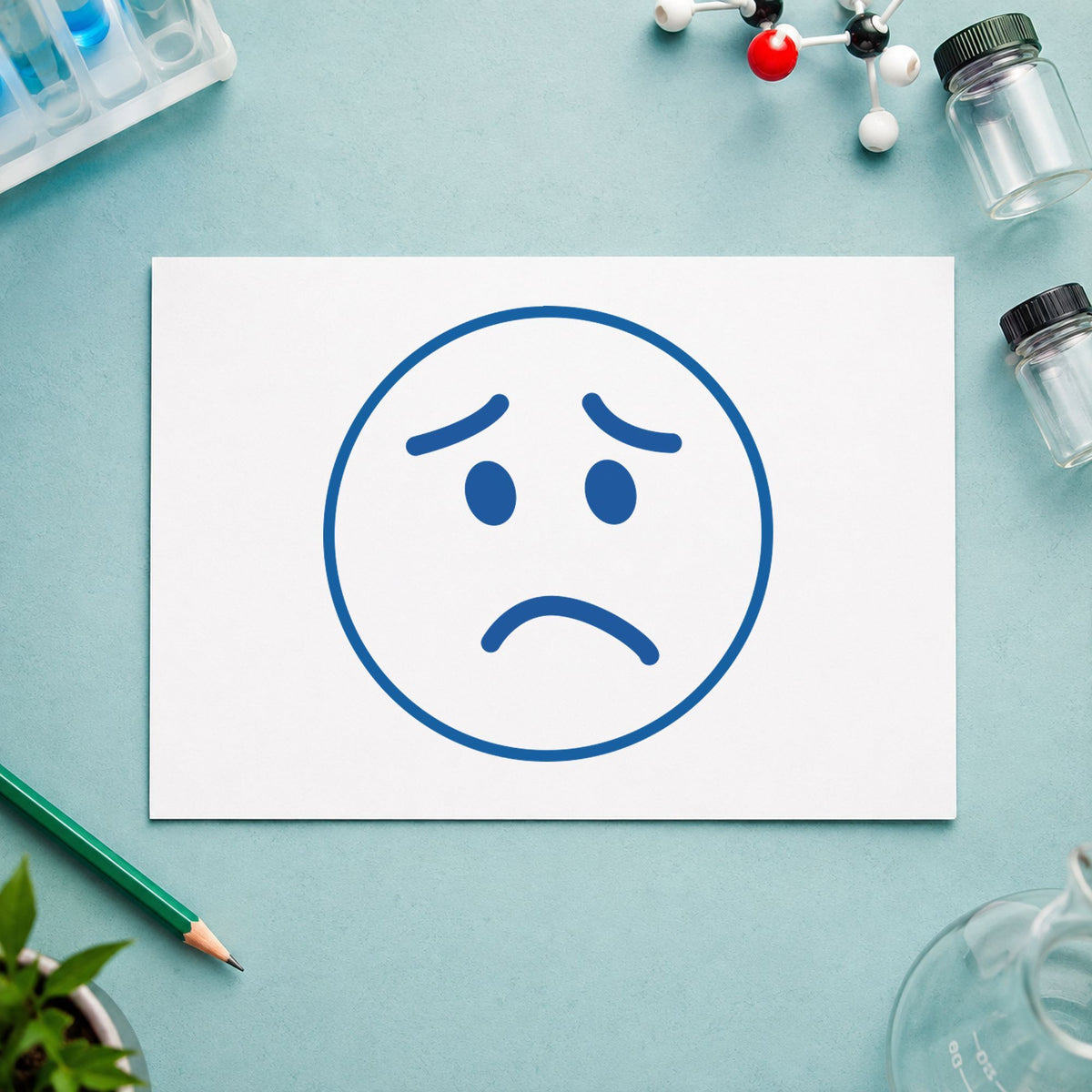 Marking a page "Frown face" with the Round Frown Face Stamp