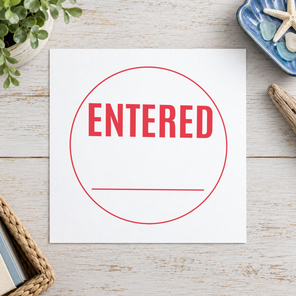 Marking a page "Entered" with the Entered Stamp For Data Entry Records – Round Pre-Inked Xstamper