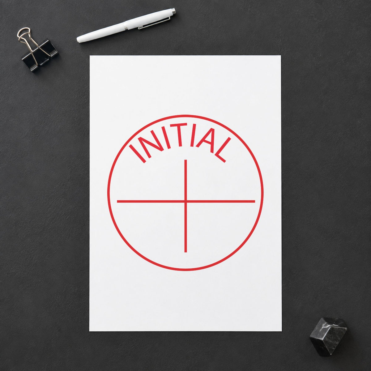 Marking a page "Initial" with the Round Initial Instruction Stamp